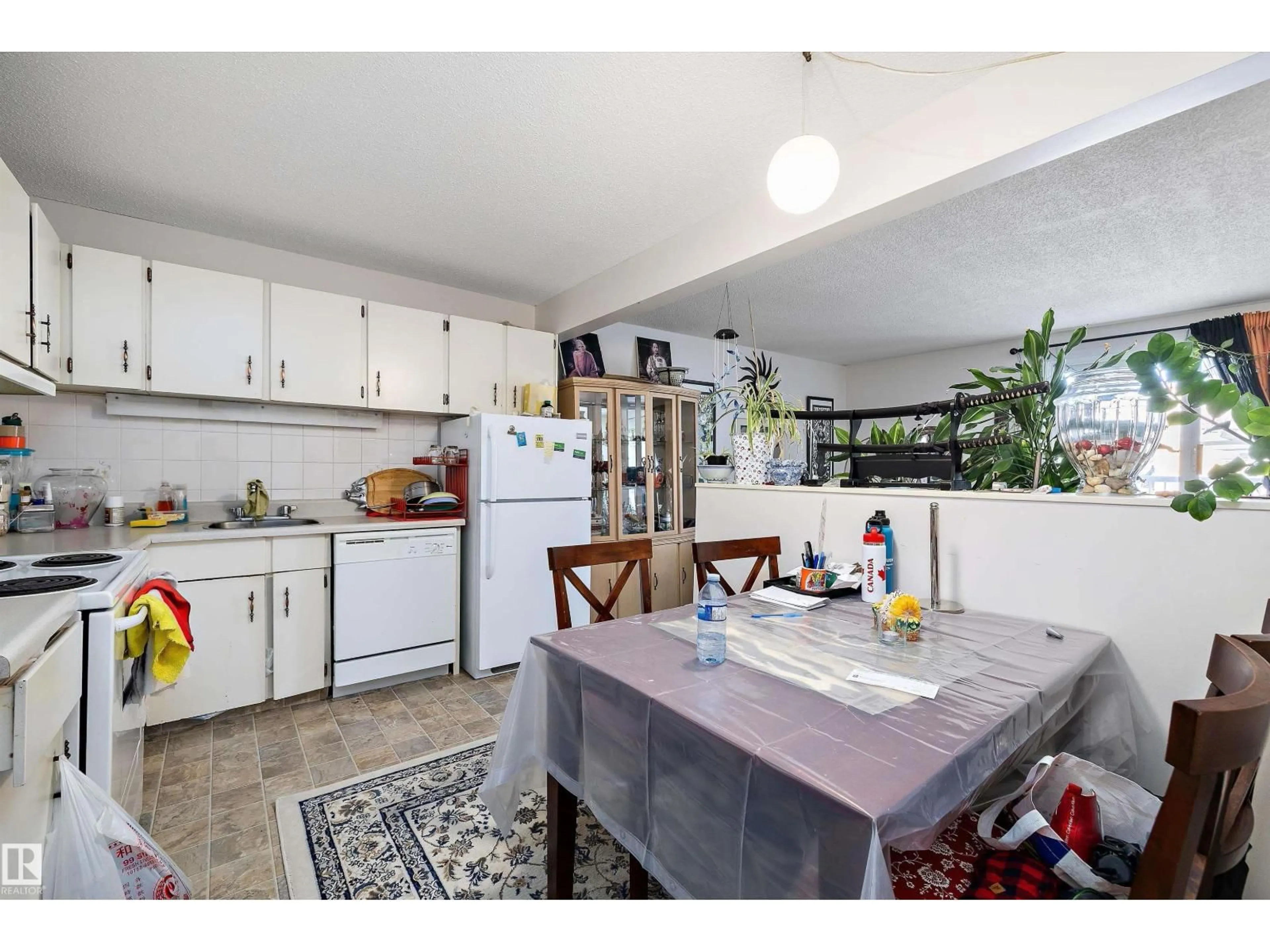 Open concept kitchen, ceramic/tile floor for #320 - 8604 GATEWAY BV, Edmonton Alberta T6E4B6