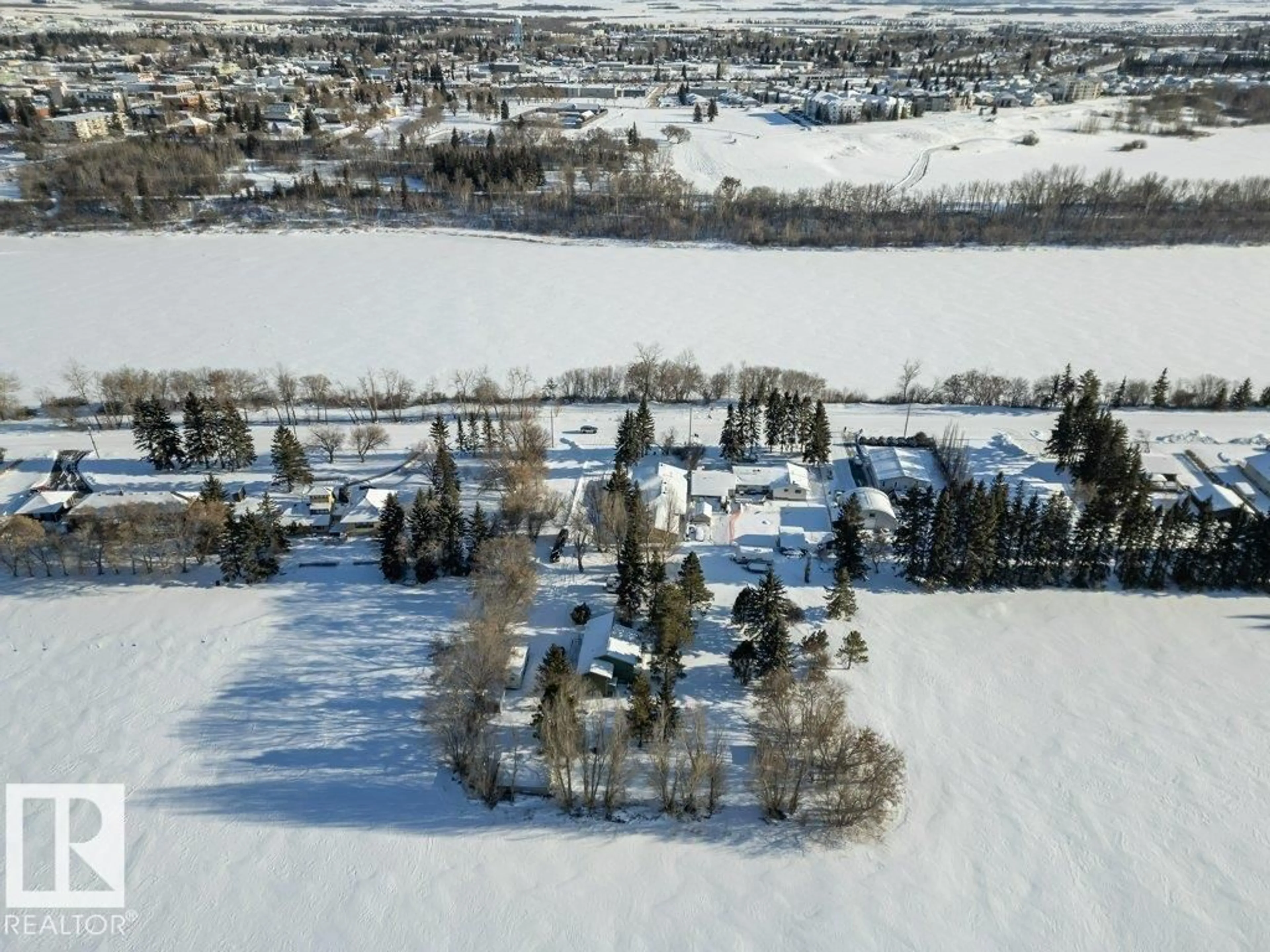 A pic from outside/outdoor area/front of a property/back of a property/a pic from drone, unknown for 55000 - 38 LAMOUREUX DR, Rural Sturgeon County Alberta T8L5A7