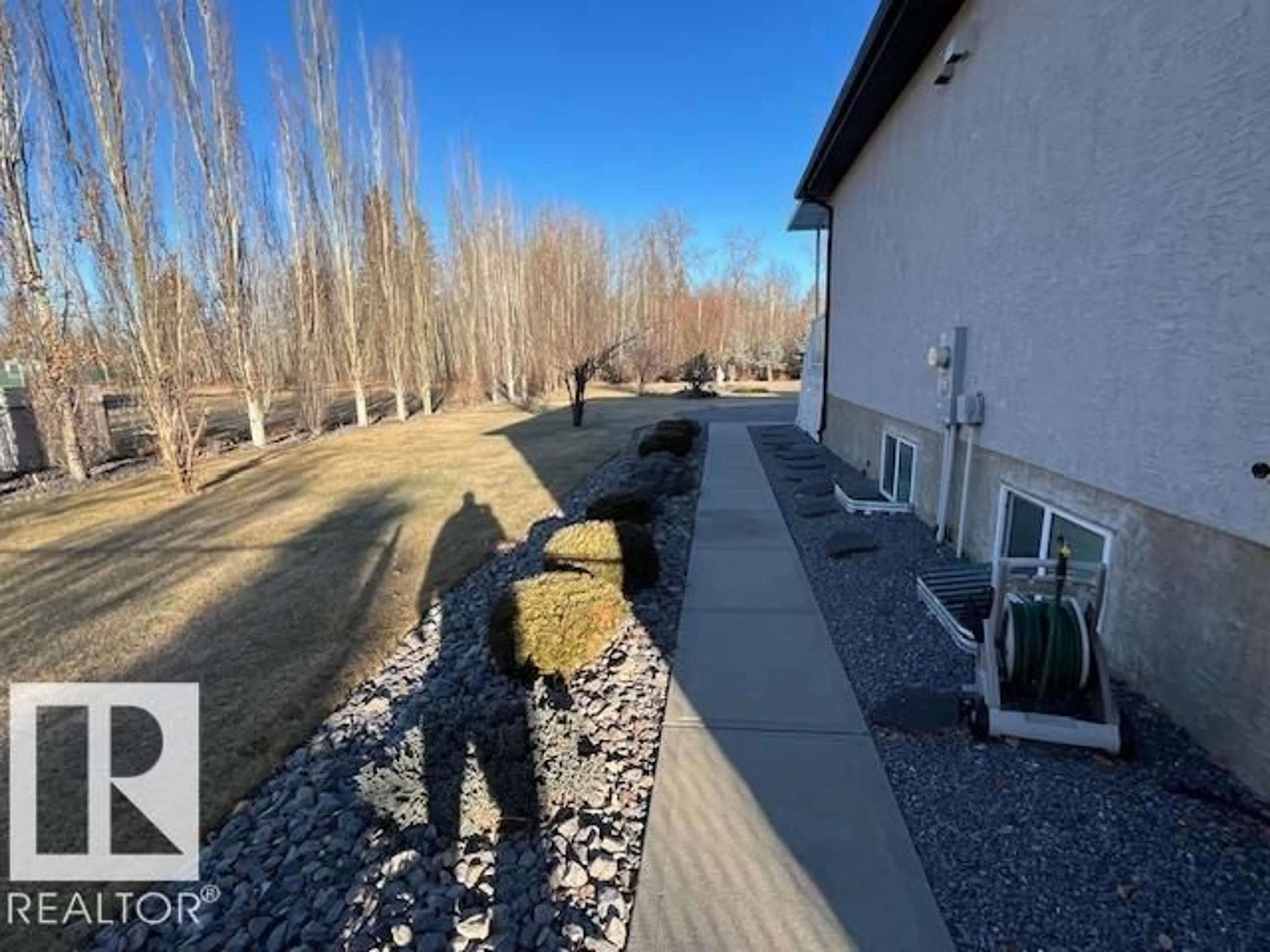 A pic from outside/outdoor area/front of a property/back of a property/a pic from drone, unknown for SW - 21428 25 AV, Edmonton Alberta T6M0E1