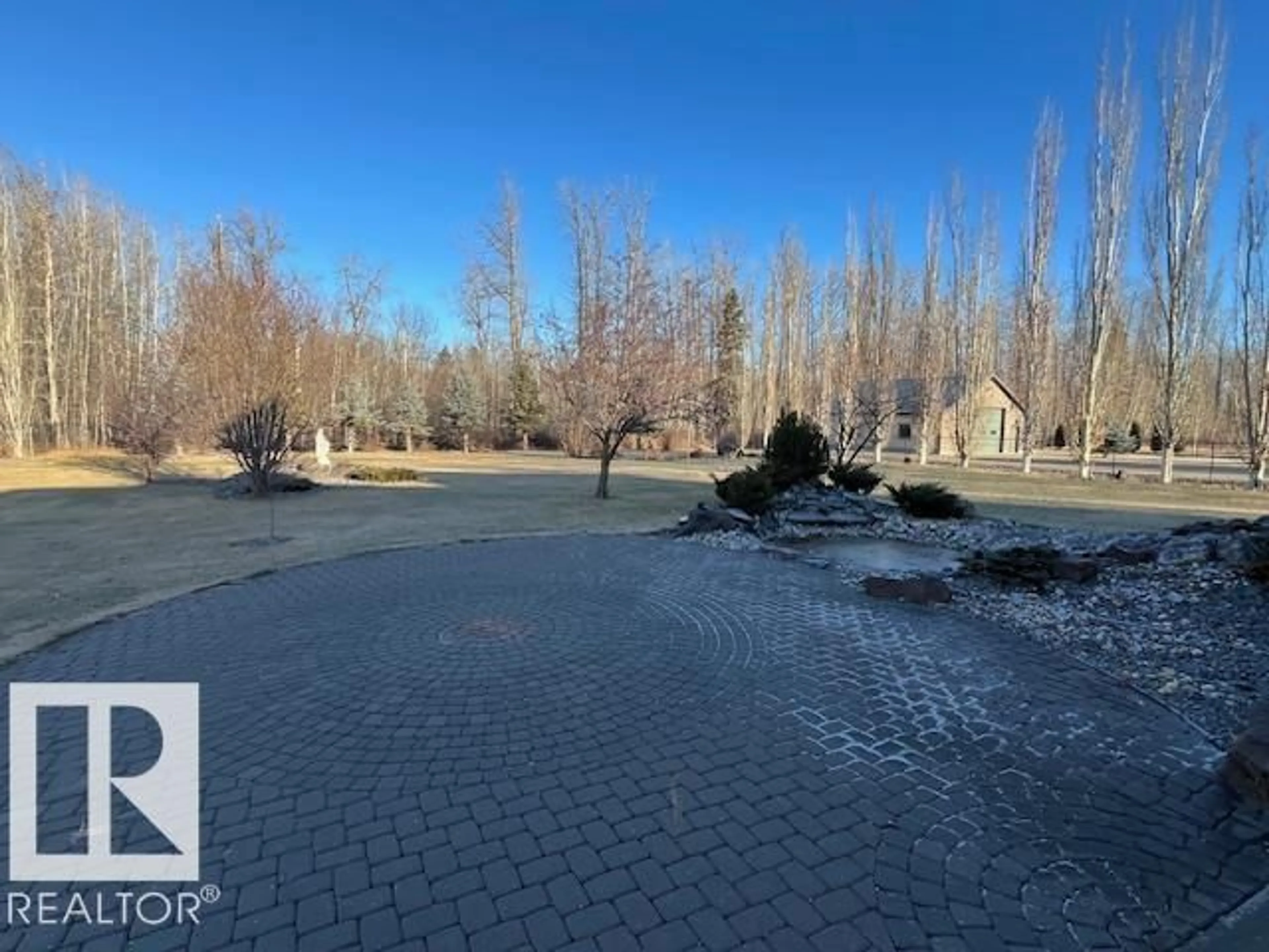A pic from outside/outdoor area/front of a property/back of a property/a pic from drone, forest/trees view for SW - 21428 25 AV, Edmonton Alberta T6M0E1
