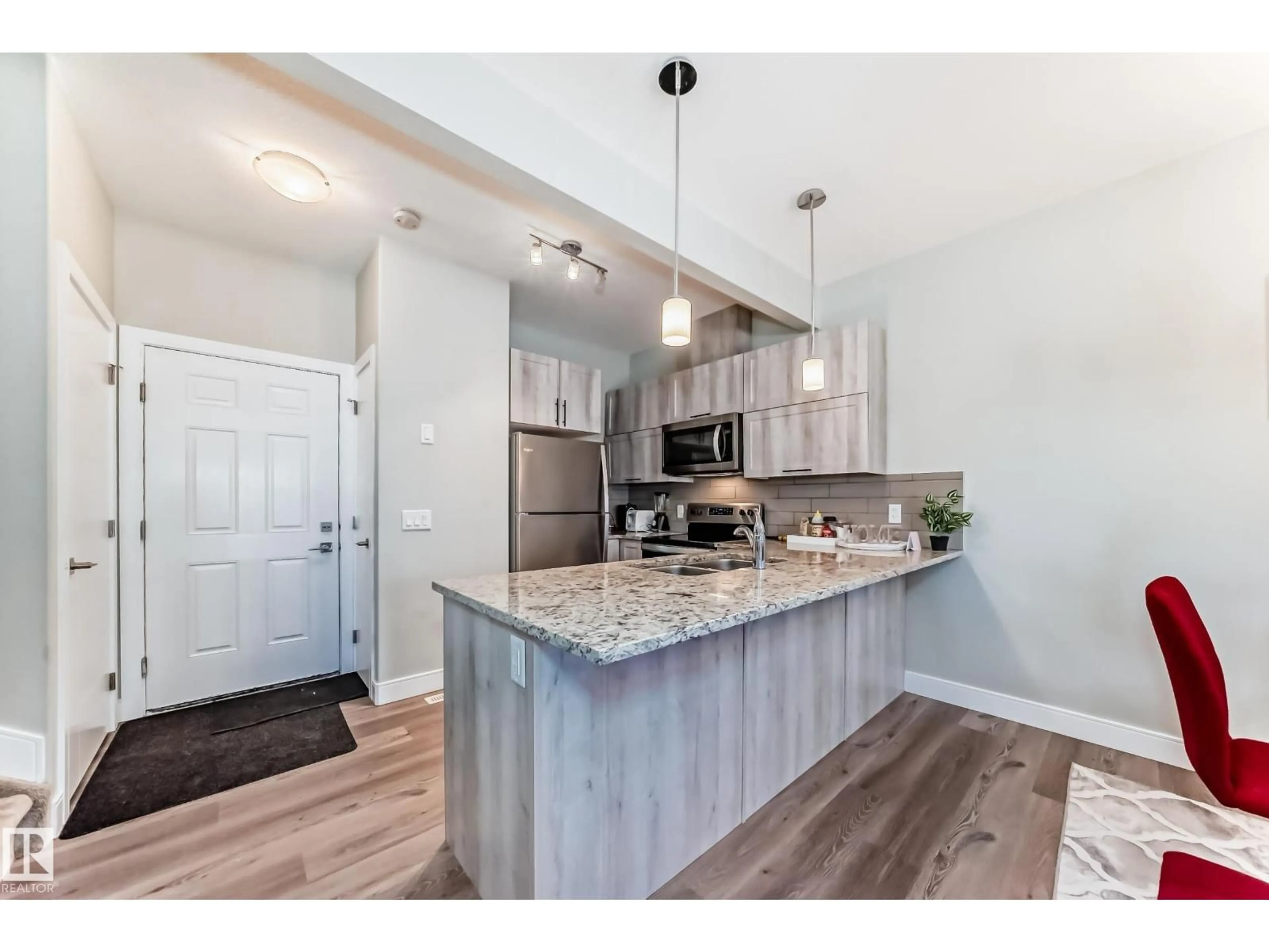 Open concept kitchen, unknown for NW - 13145 132 ST, Edmonton Alberta T5E3V1