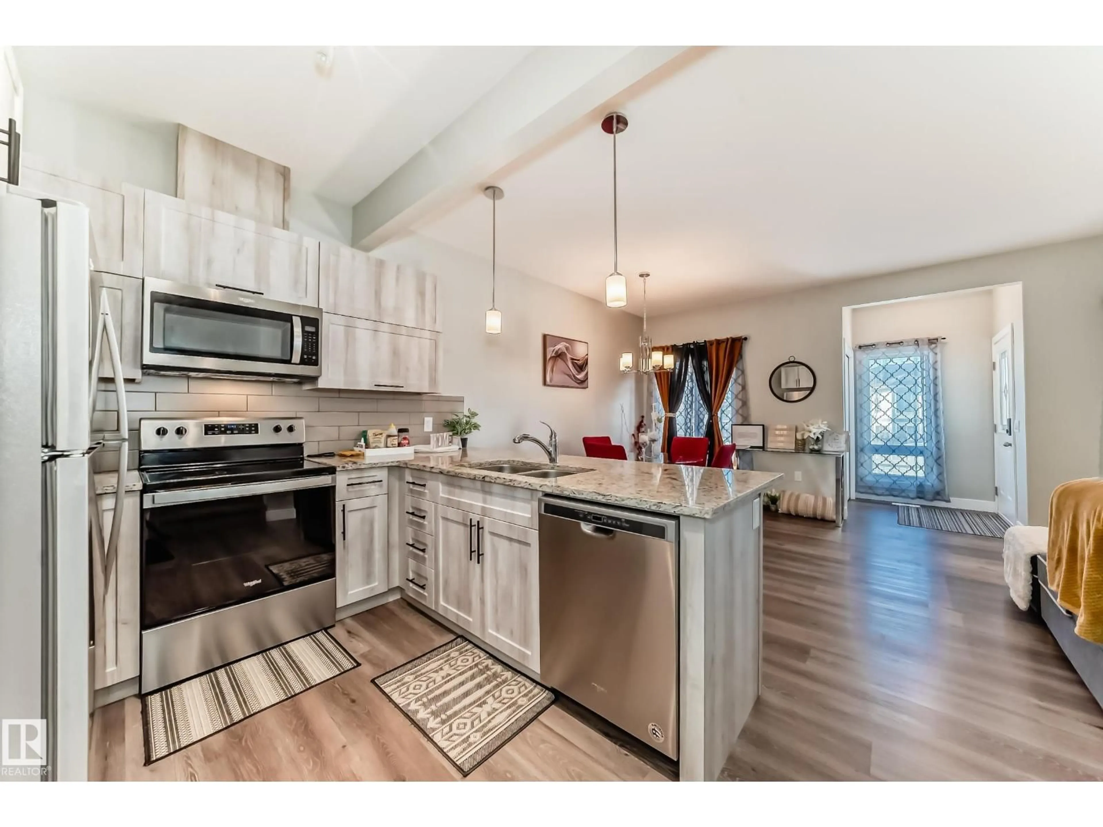 Open concept kitchen, unknown for NW - 13145 132 ST, Edmonton Alberta T5E3V1