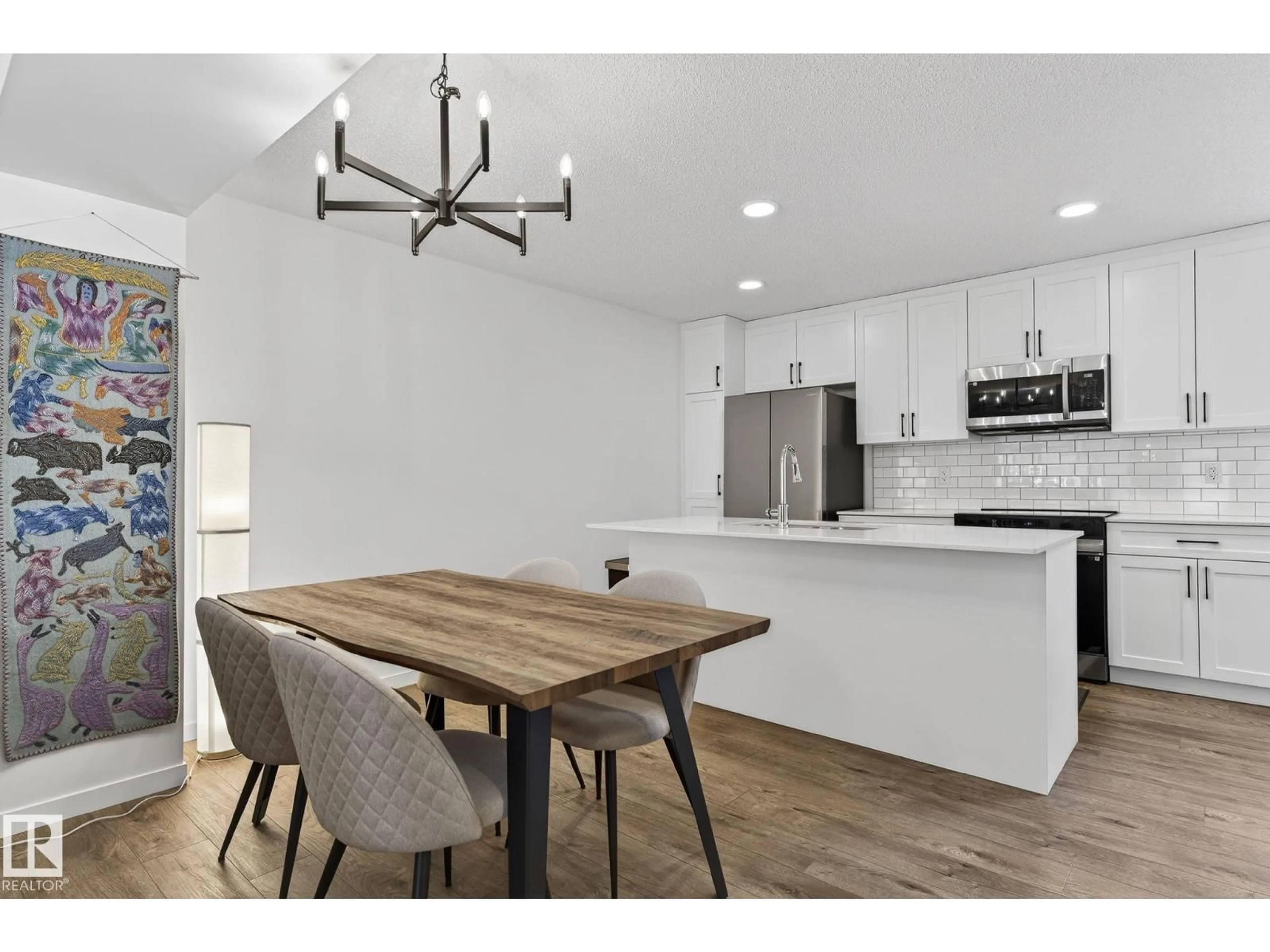 Open concept kitchen, wood/laminate floor for #7 - 50 MCLAUGHLIN DR, Spruce Grove Alberta T7X0E1