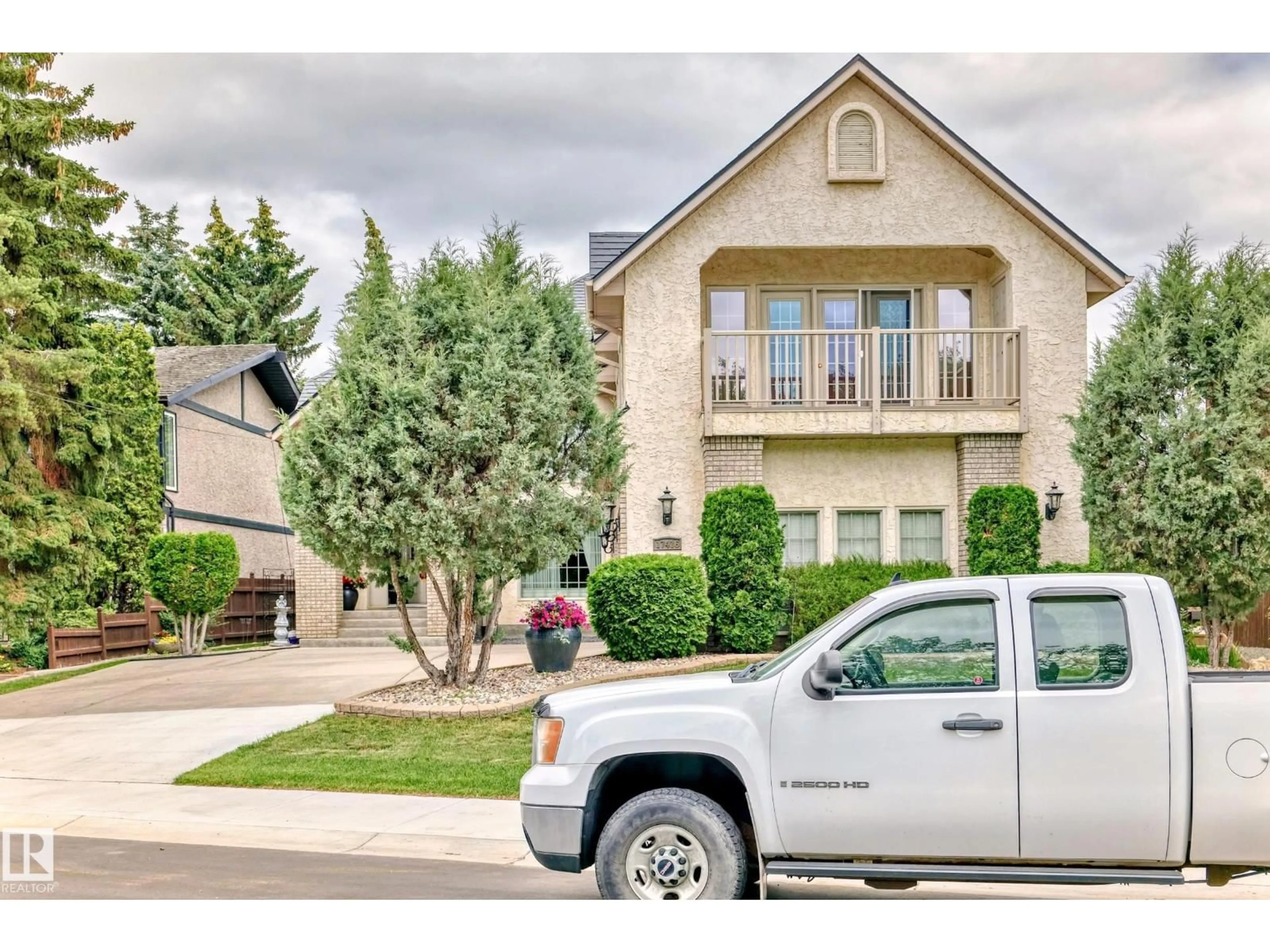 Home with vinyl exterior material, street for NW - 17416 53 AV, Edmonton Alberta T6M1C4