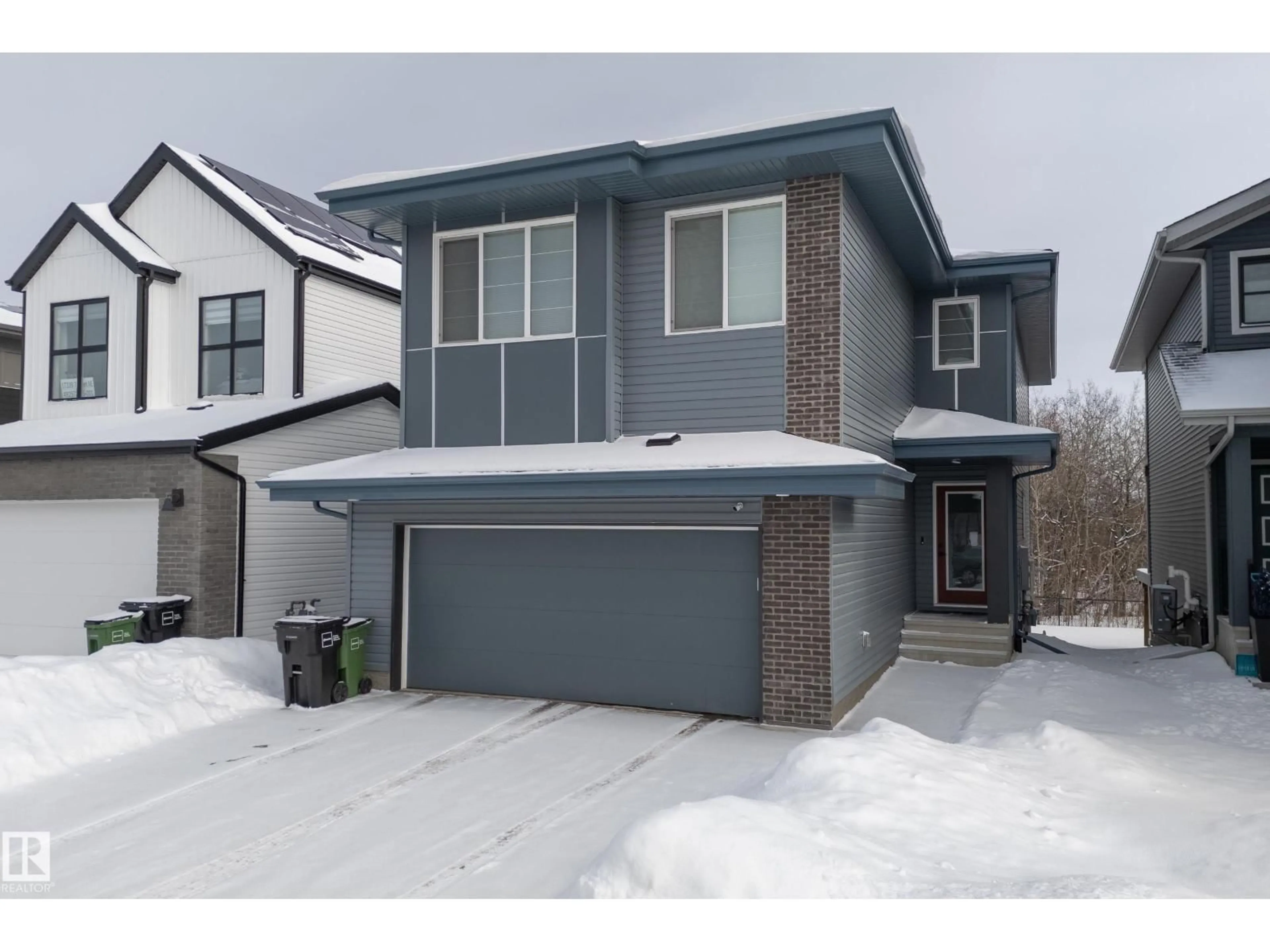 Home with brick exterior material, street for NE - 17335 7 ST, Edmonton Alberta T5Y4E7