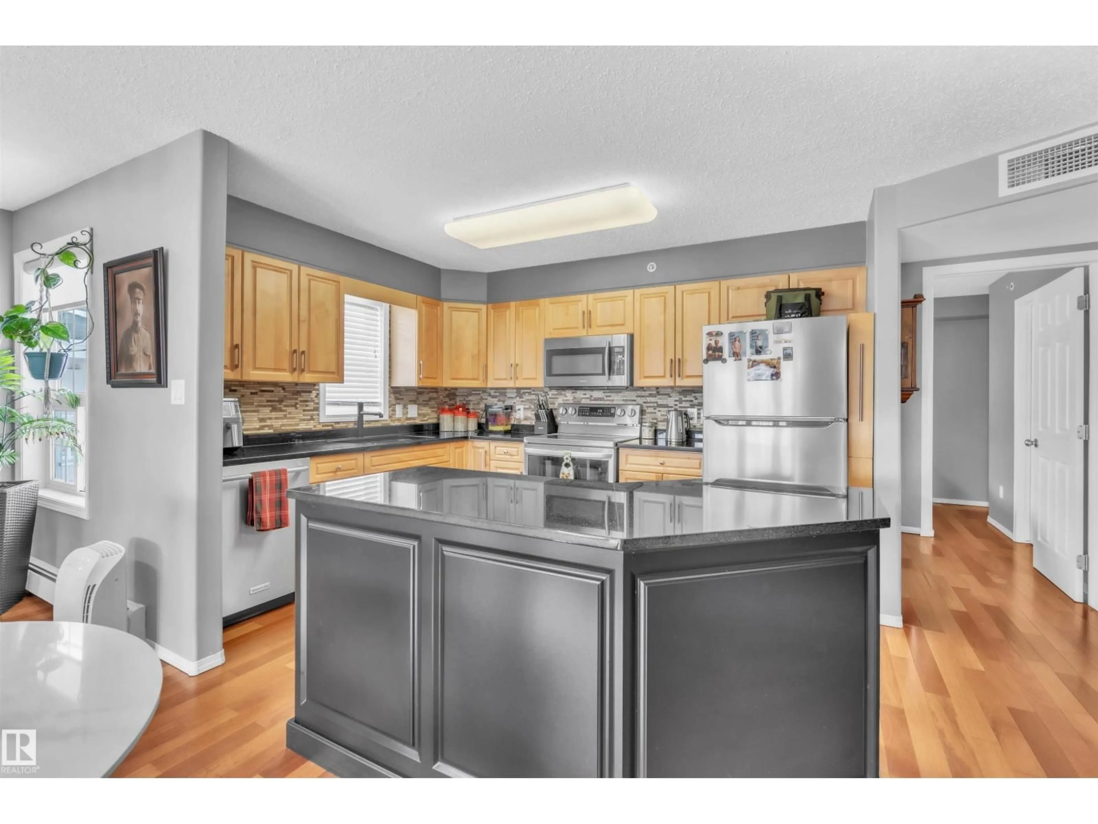 Open concept kitchen, unknown for 306 - 1605 7 AV, Cold Lake Alberta T9M0A6