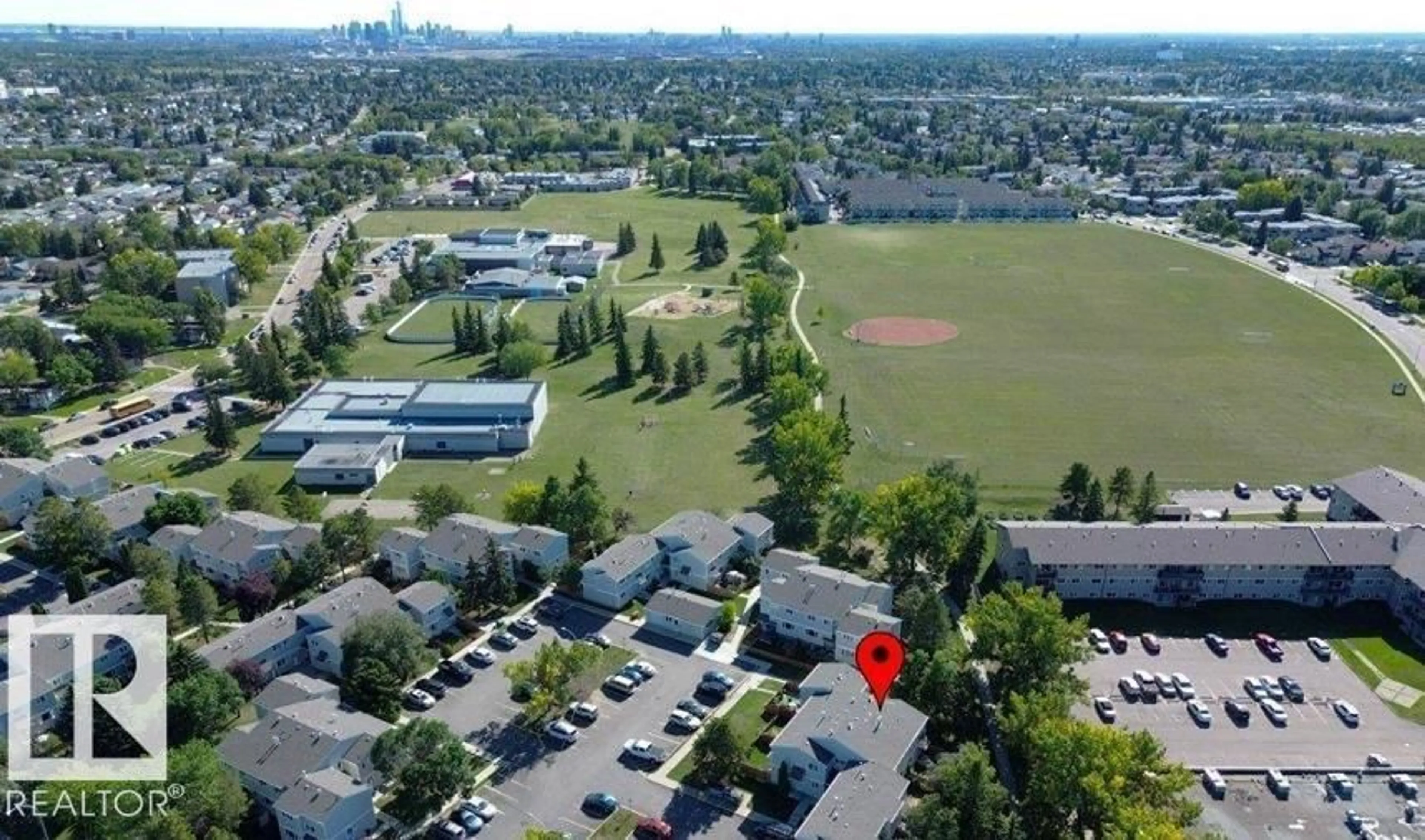 A pic from outside/outdoor area/front of a property/back of a property/a pic from drone, unknown for 12A CASTLE TC, Edmonton Alberta T5X2E6