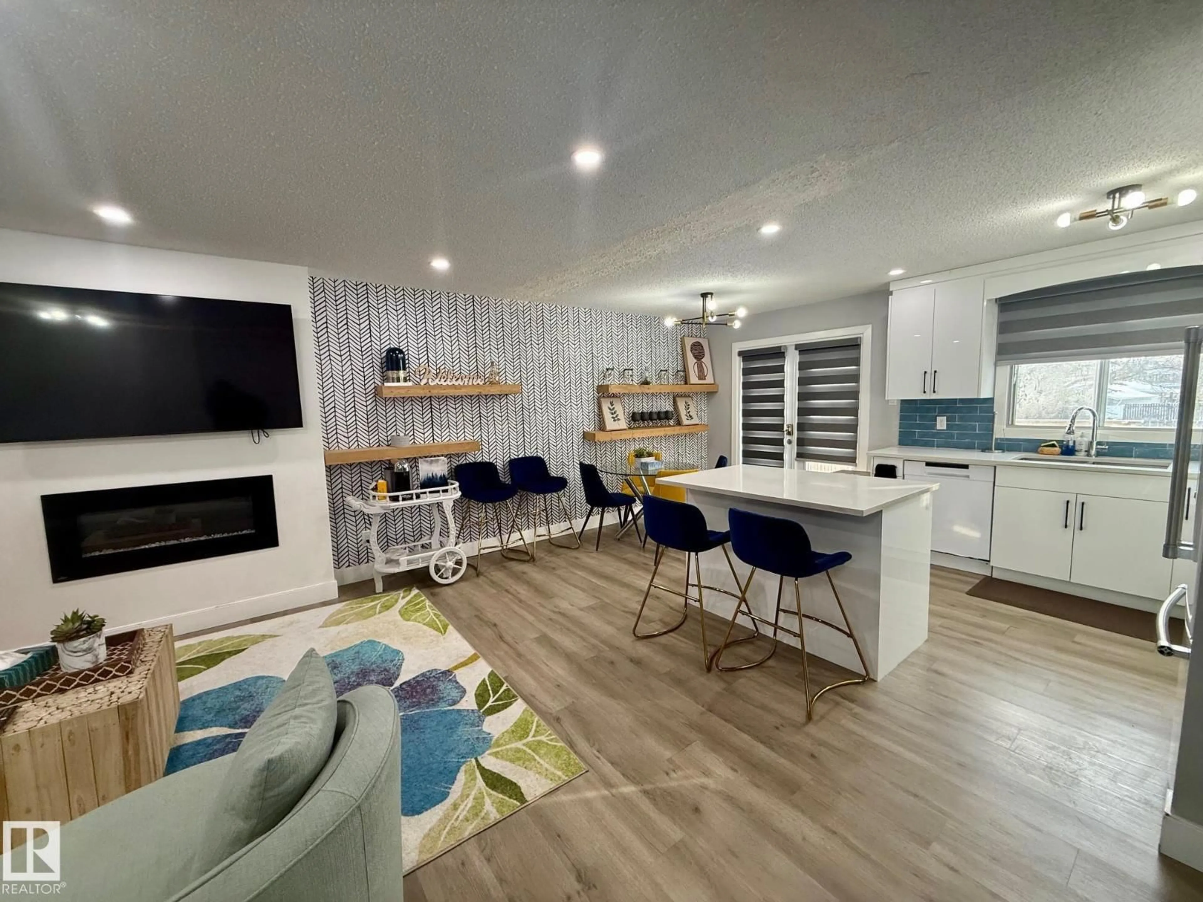 Open concept kitchen, wood/laminate floor for 2915 145 AV, Edmonton Alberta T5Y1Z2