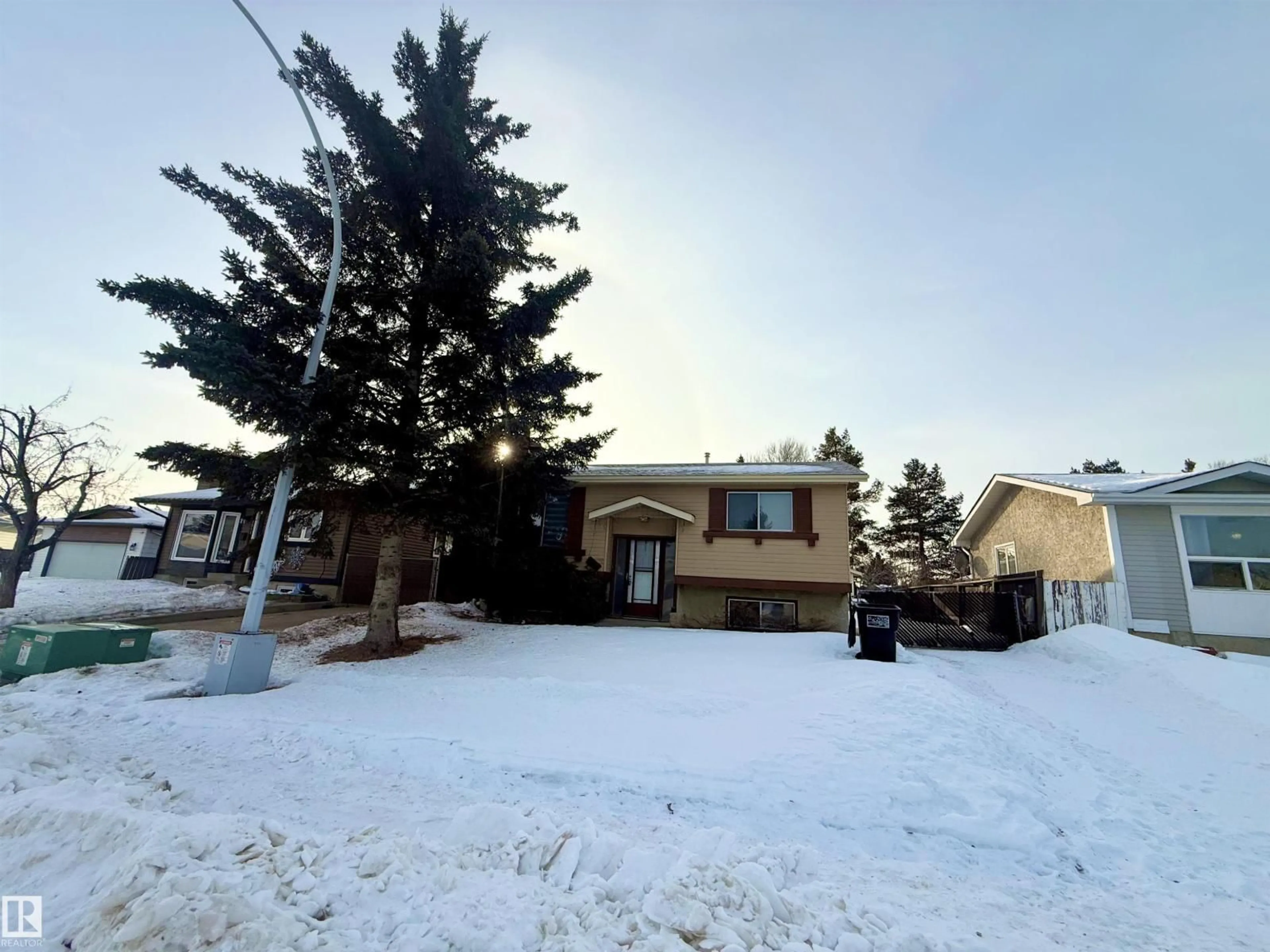 A pic from outside/outdoor area/front of a property/back of a property/a pic from drone, street for 2915 145 AV, Edmonton Alberta T5Y1Z2