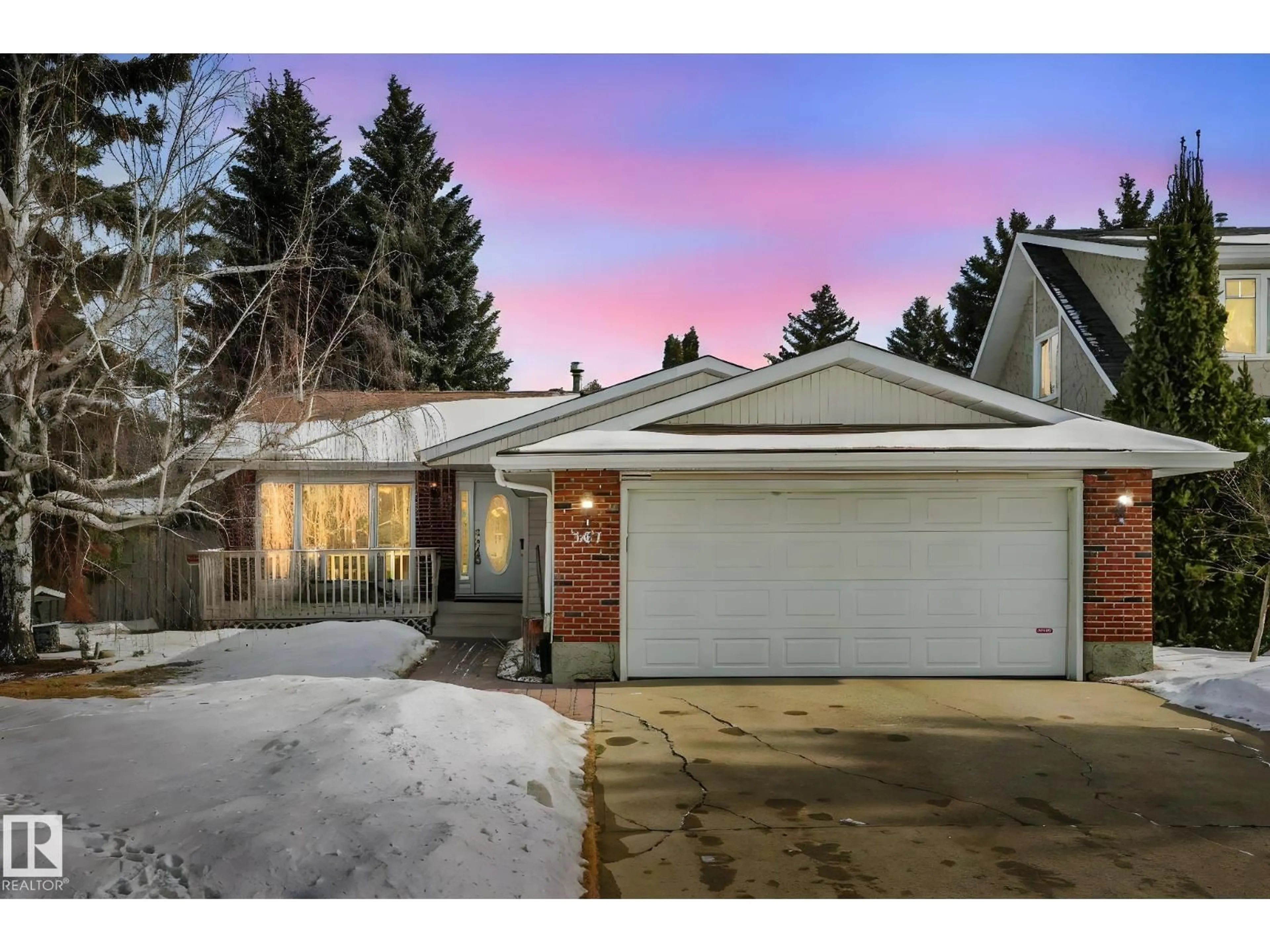 Home with brick exterior material, street for 587 WAHSTAO RD, Edmonton Alberta T5T2X9