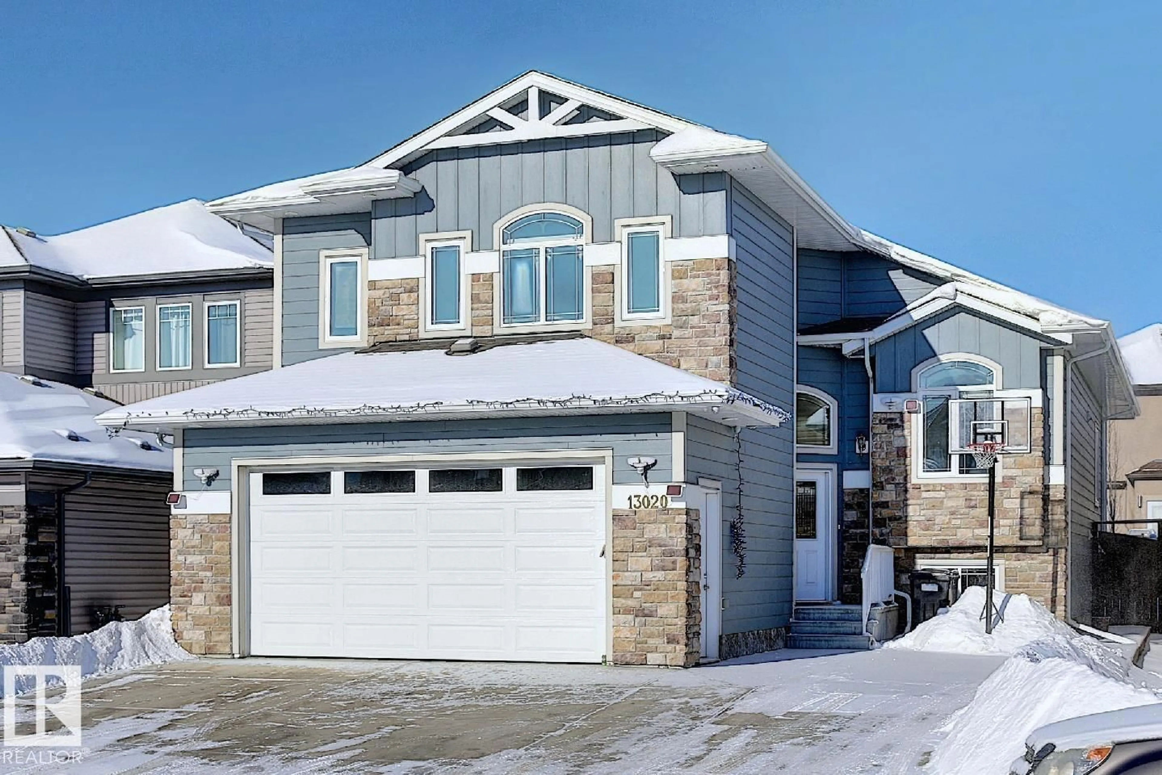 Home with vinyl exterior material, street for 13020 164 AV, Edmonton Alberta T6V0E7