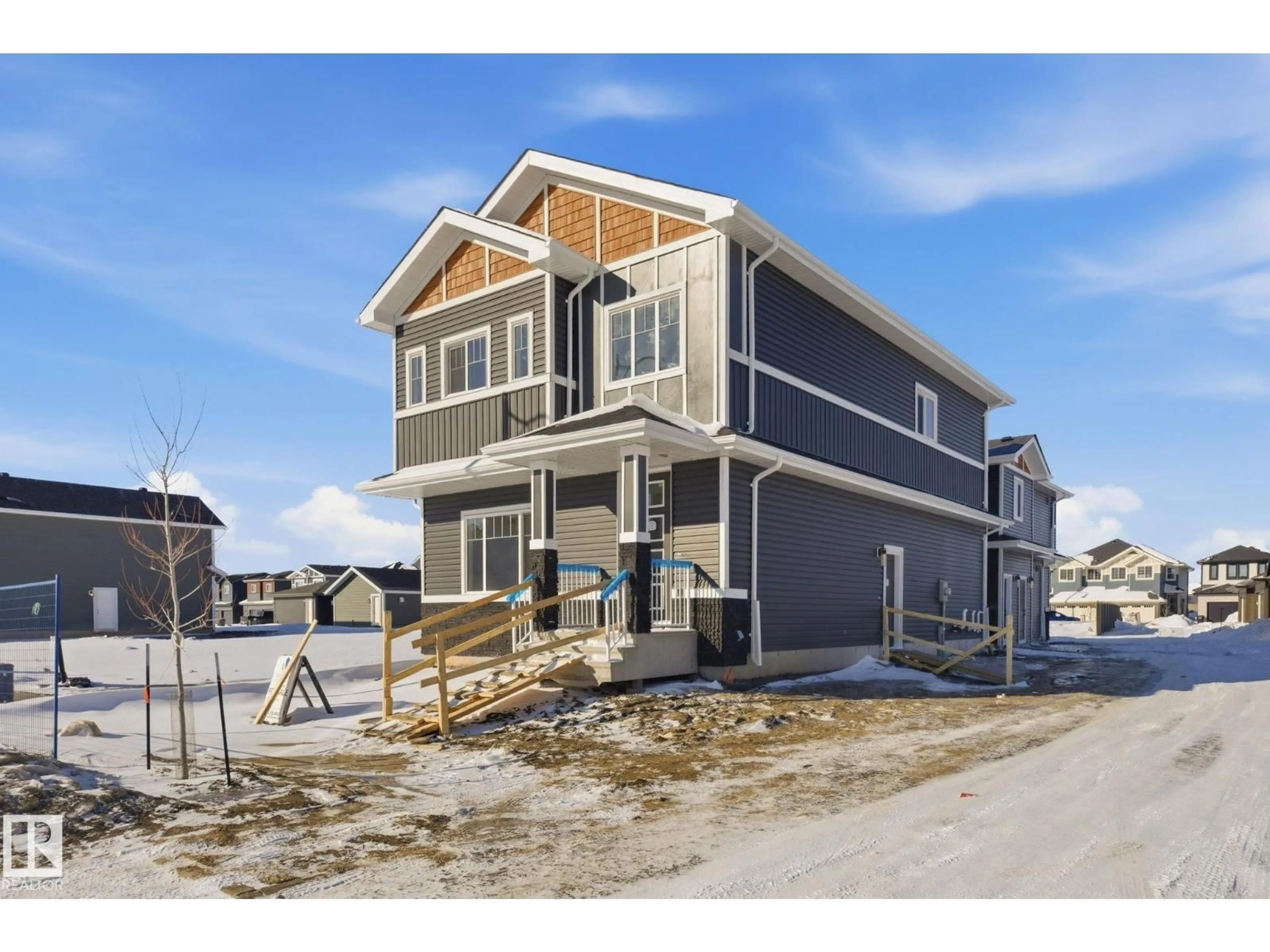 Home with vinyl exterior material, street for 3212 DALLAS SCHMIDT DR, Edmonton Alberta T5E7A8