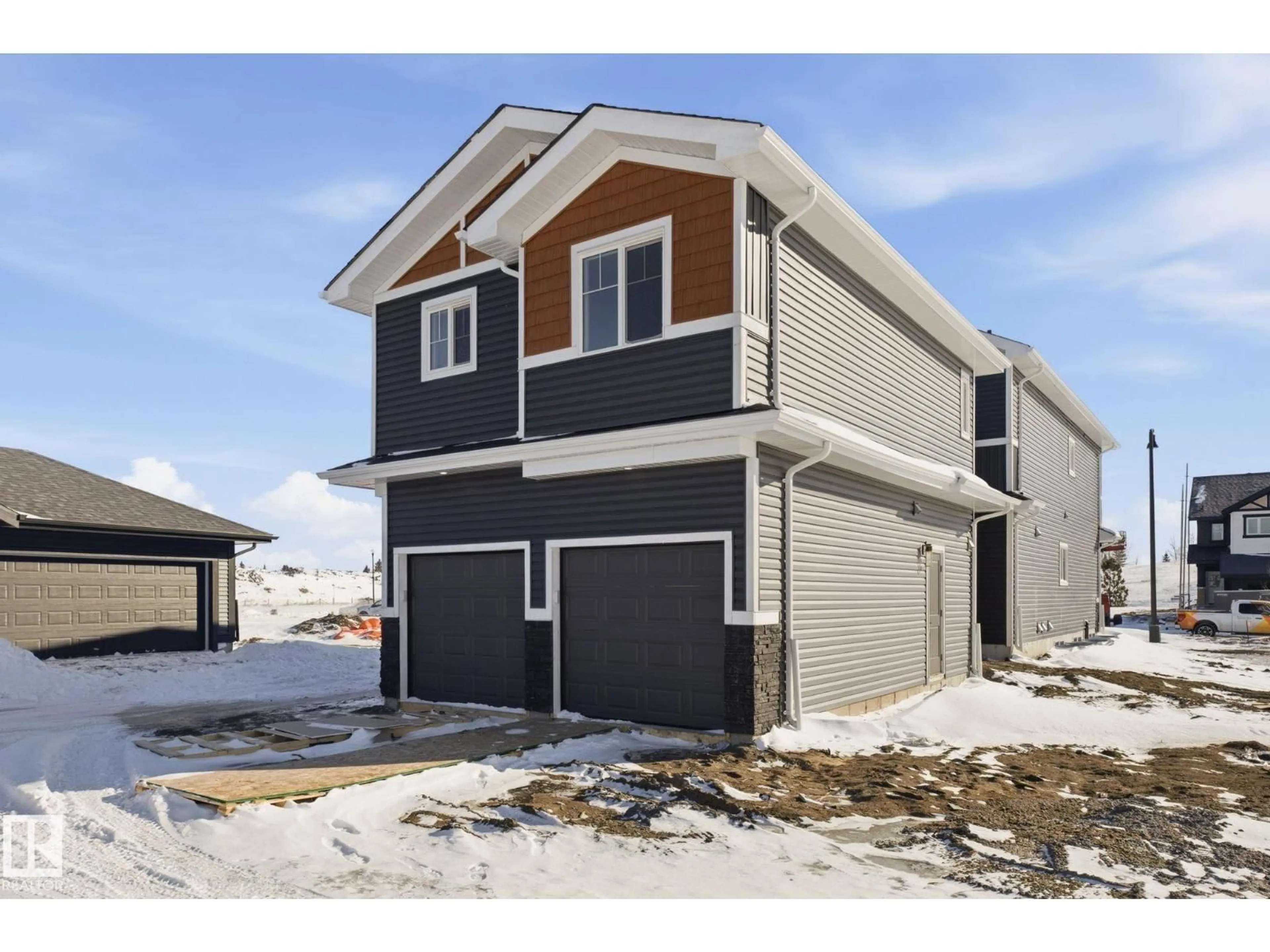 Home with vinyl exterior material, street for 3212 DALLAS SCHMIDT DR, Edmonton Alberta T5E7A8