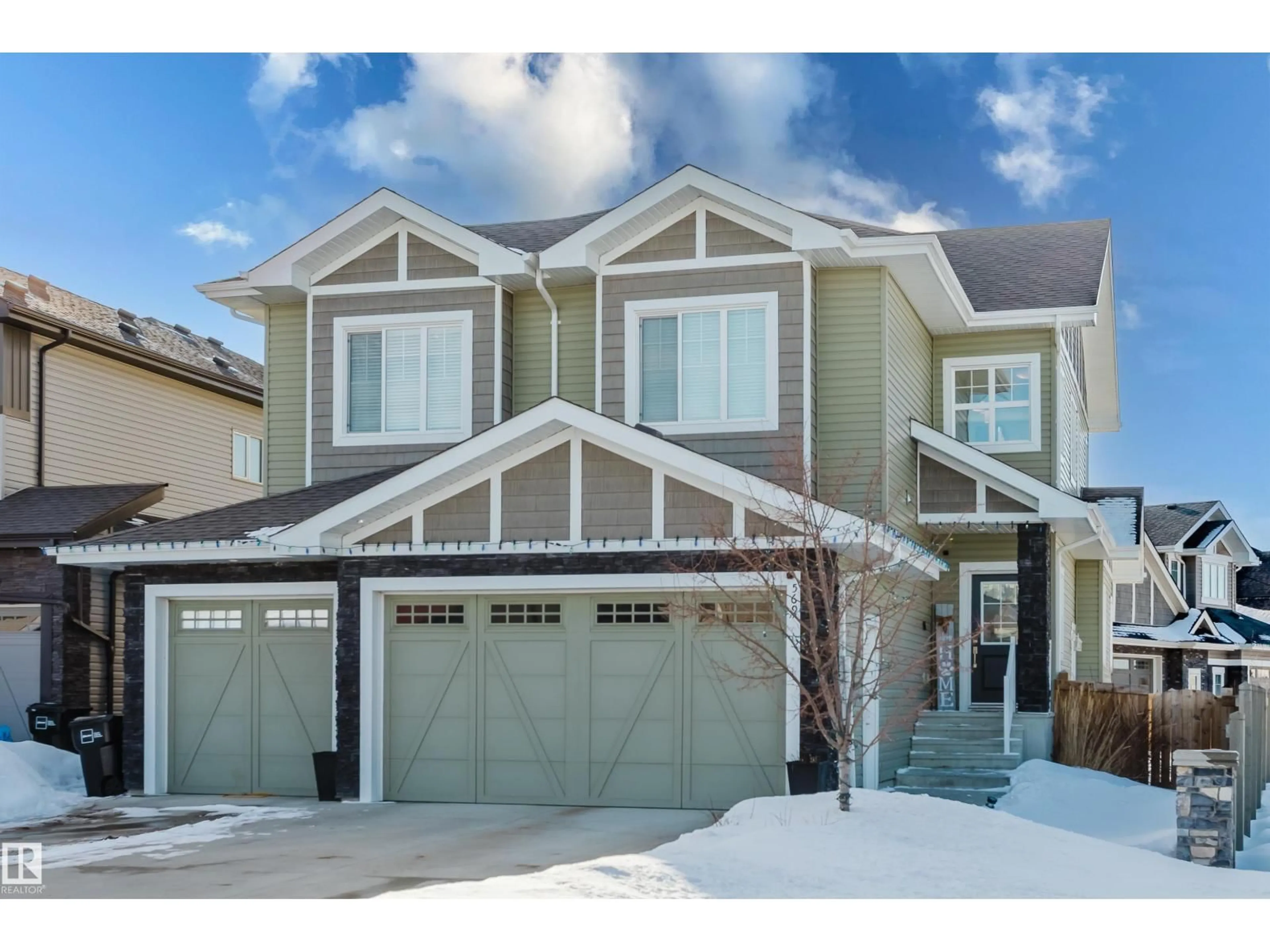 Home with vinyl exterior material, street for 569 MERLIN LANDING LD, Edmonton Alberta T5S0L9