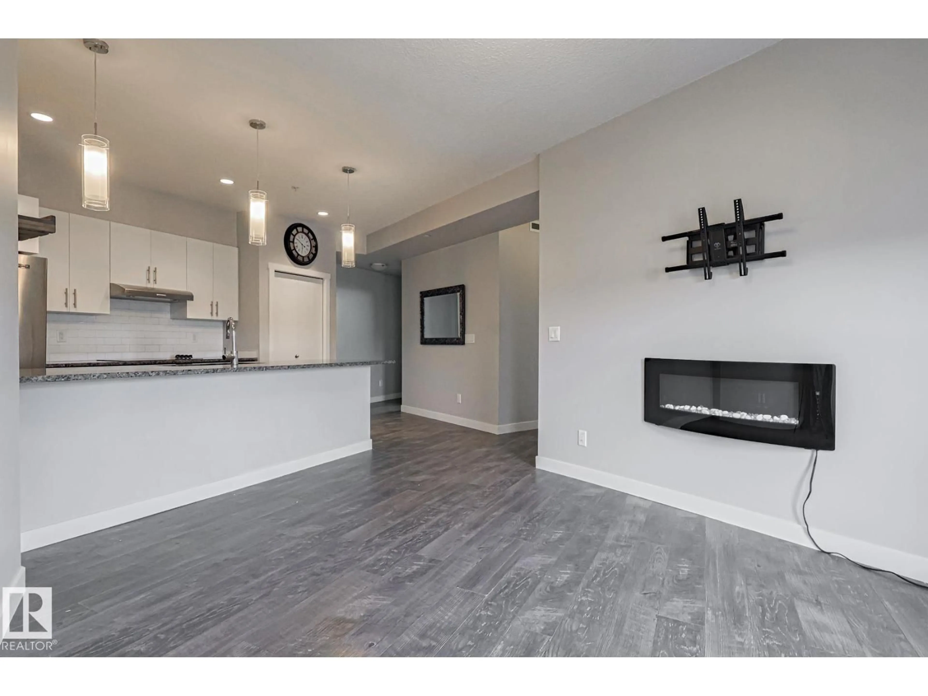 Open concept kitchen, wood/laminate floor for 404 - 10126 144 ST, Edmonton Alberta T5N2T7