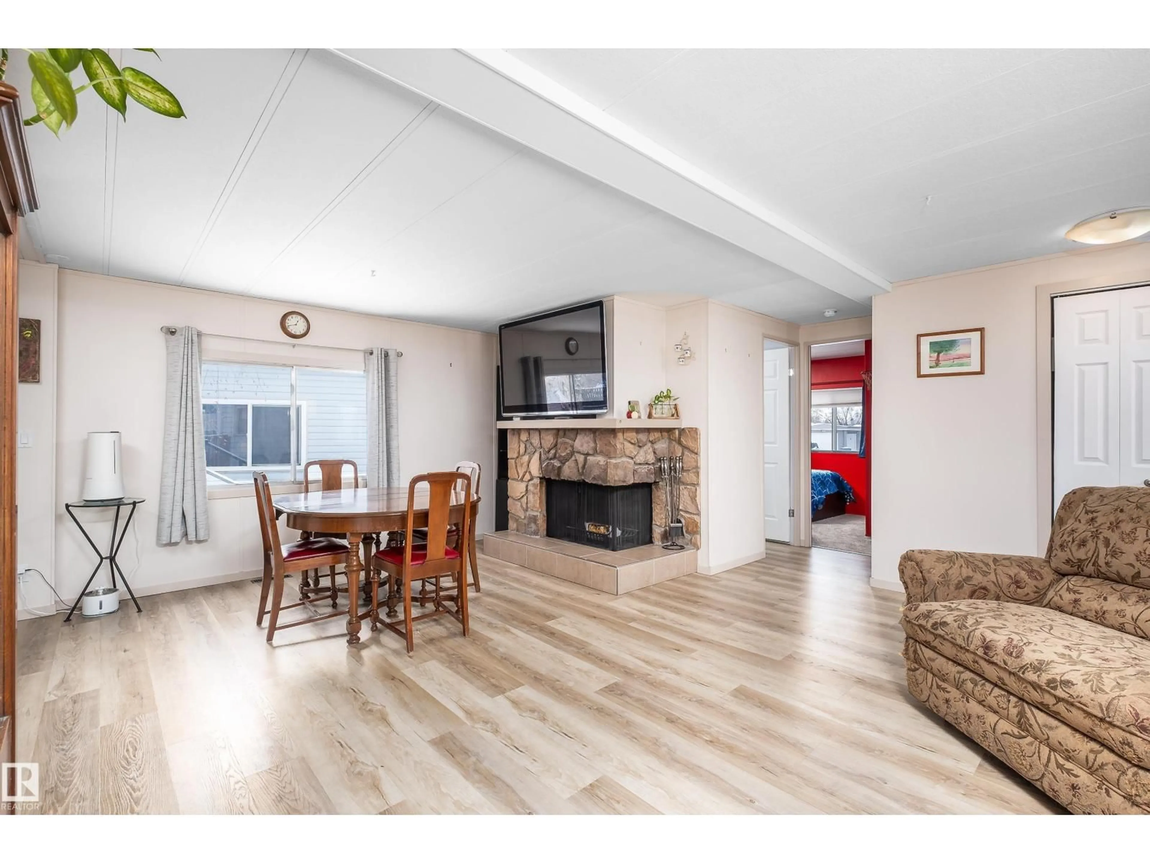 Living room with furniture, wood/laminate floor for NW - 1706 WEST OAK CL, Edmonton Alberta T5S1T6