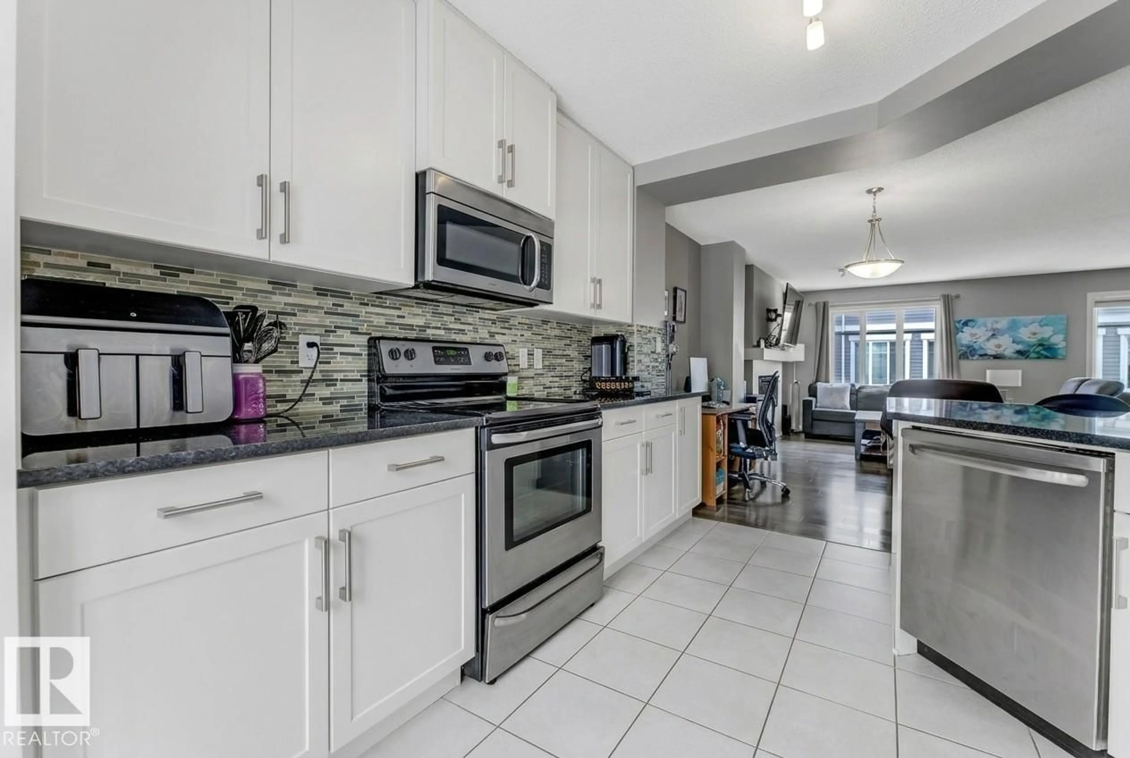 Open concept kitchen, ceramic/tile floor for #127 - 2905 141 ST, Edmonton Alberta T6W3M4