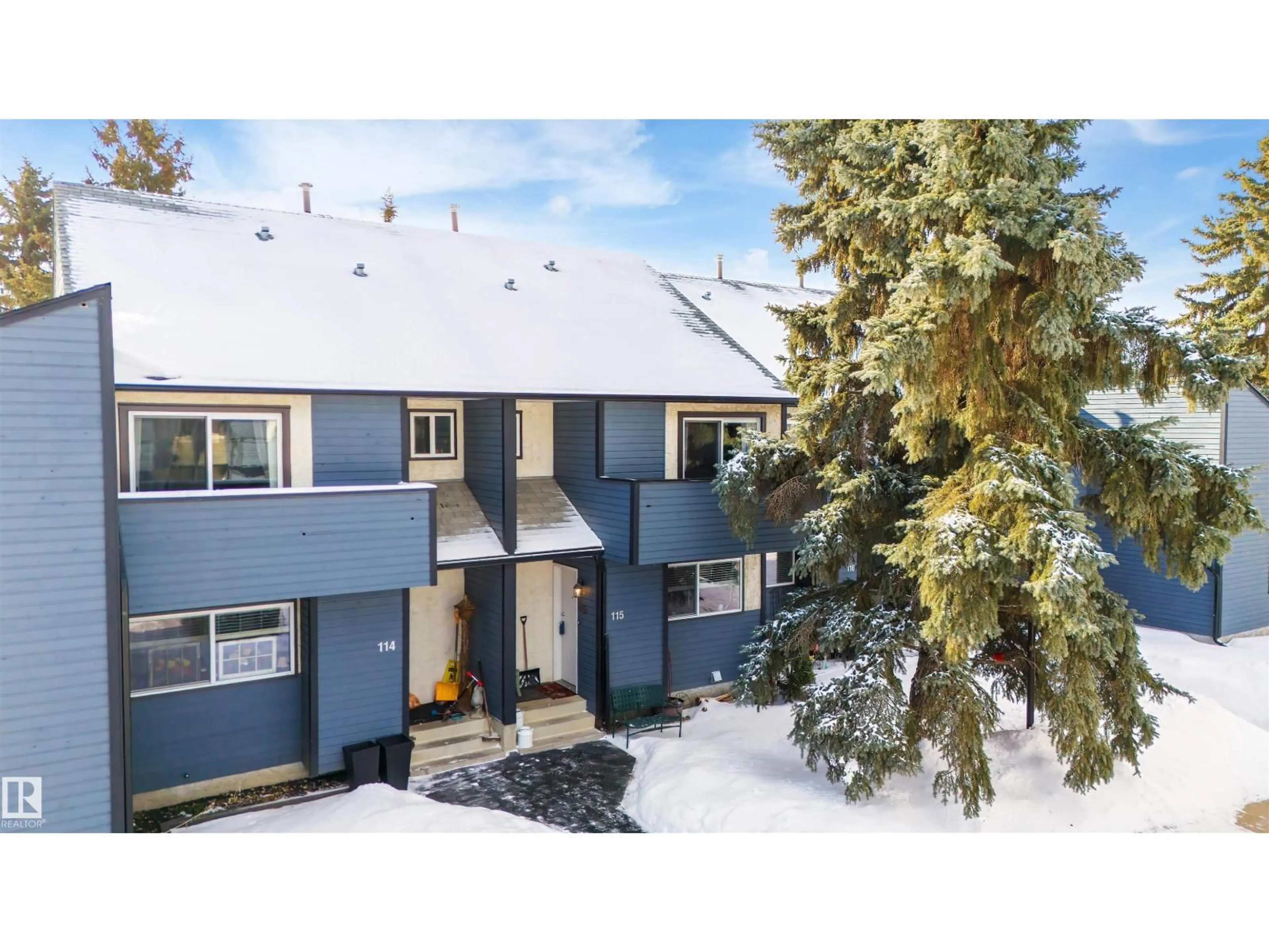 A pic from outside/outdoor area/front of a property/back of a property/a pic from drone, mountain view for 115 GARDEN RD, St. Albert Alberta T8N5G8