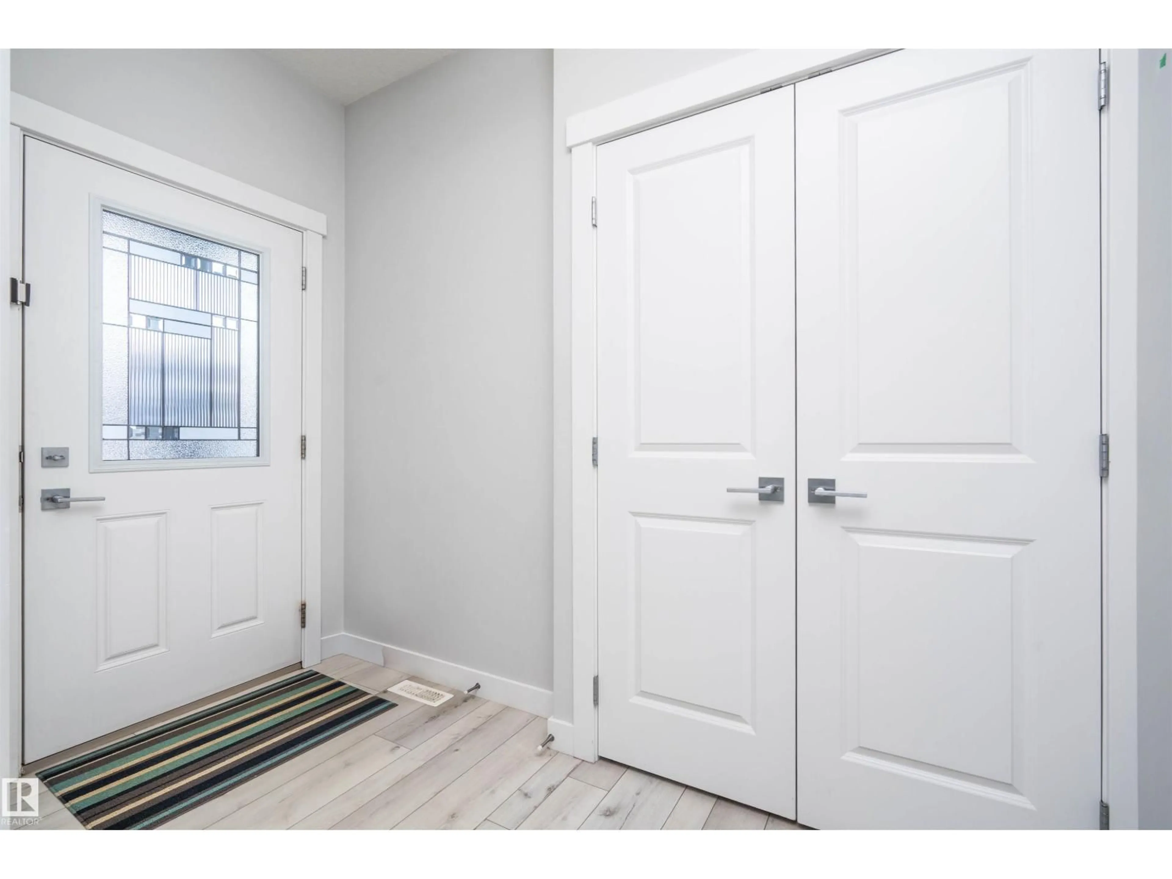 Indoor entryway for 2420 15 AV, Edmonton Alberta T6T2L3