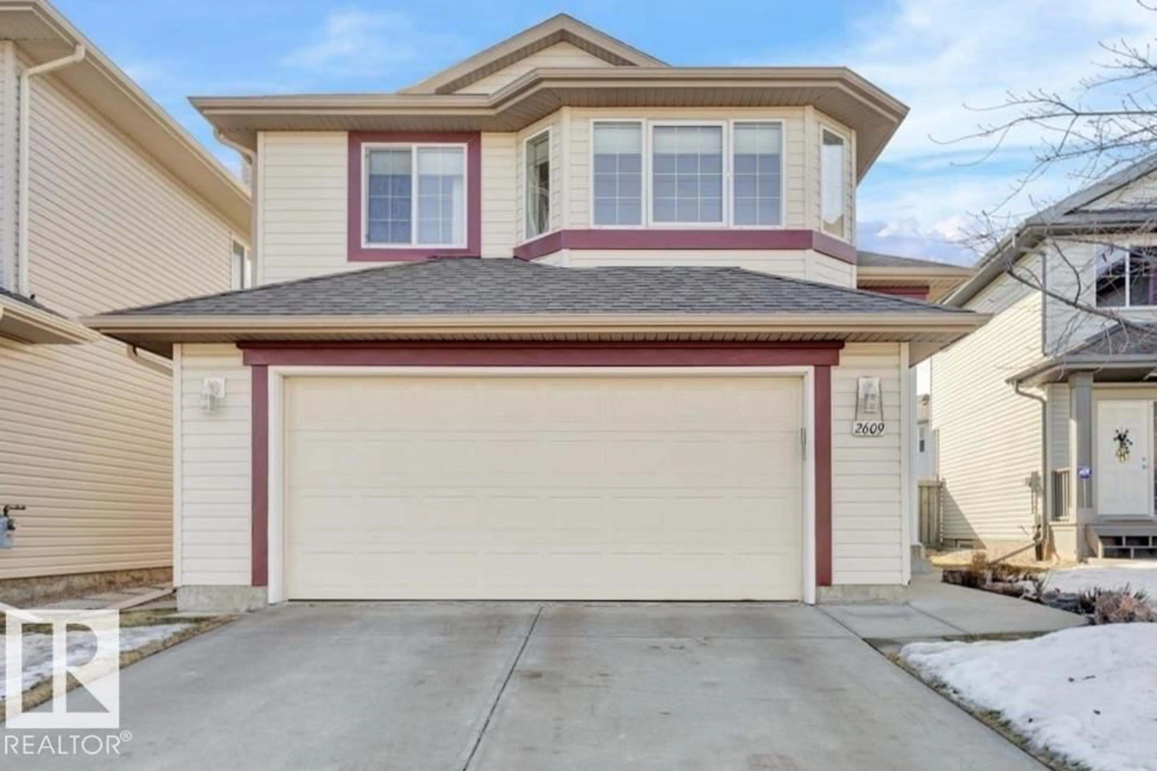 Home with vinyl exterior material, street for 2609 MARION PL, Edmonton Alberta T6W1P9