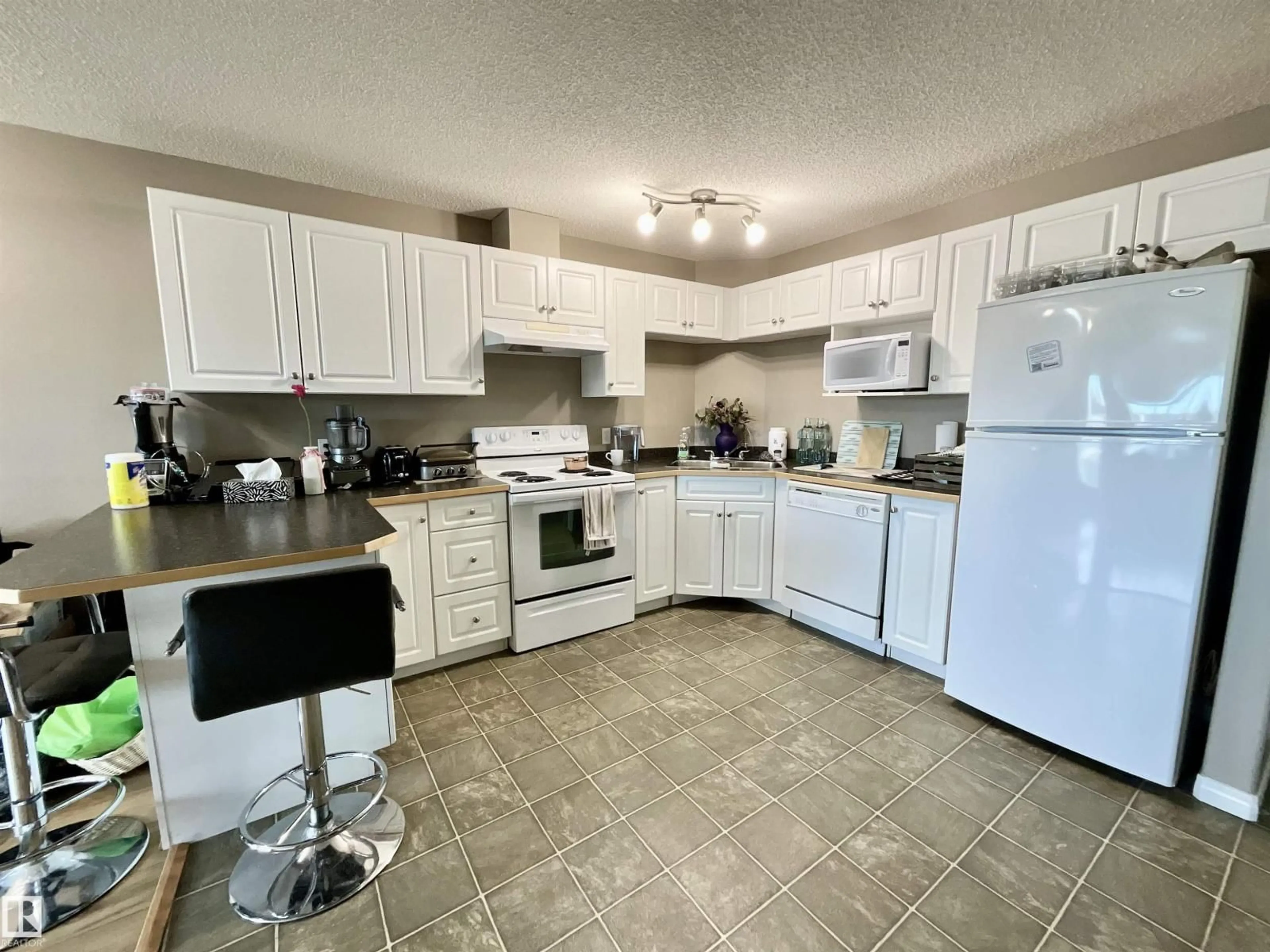 Standard kitchen, ceramic/tile floor for #308 - 5350 199 ST, Edmonton Alberta T6M0A4
