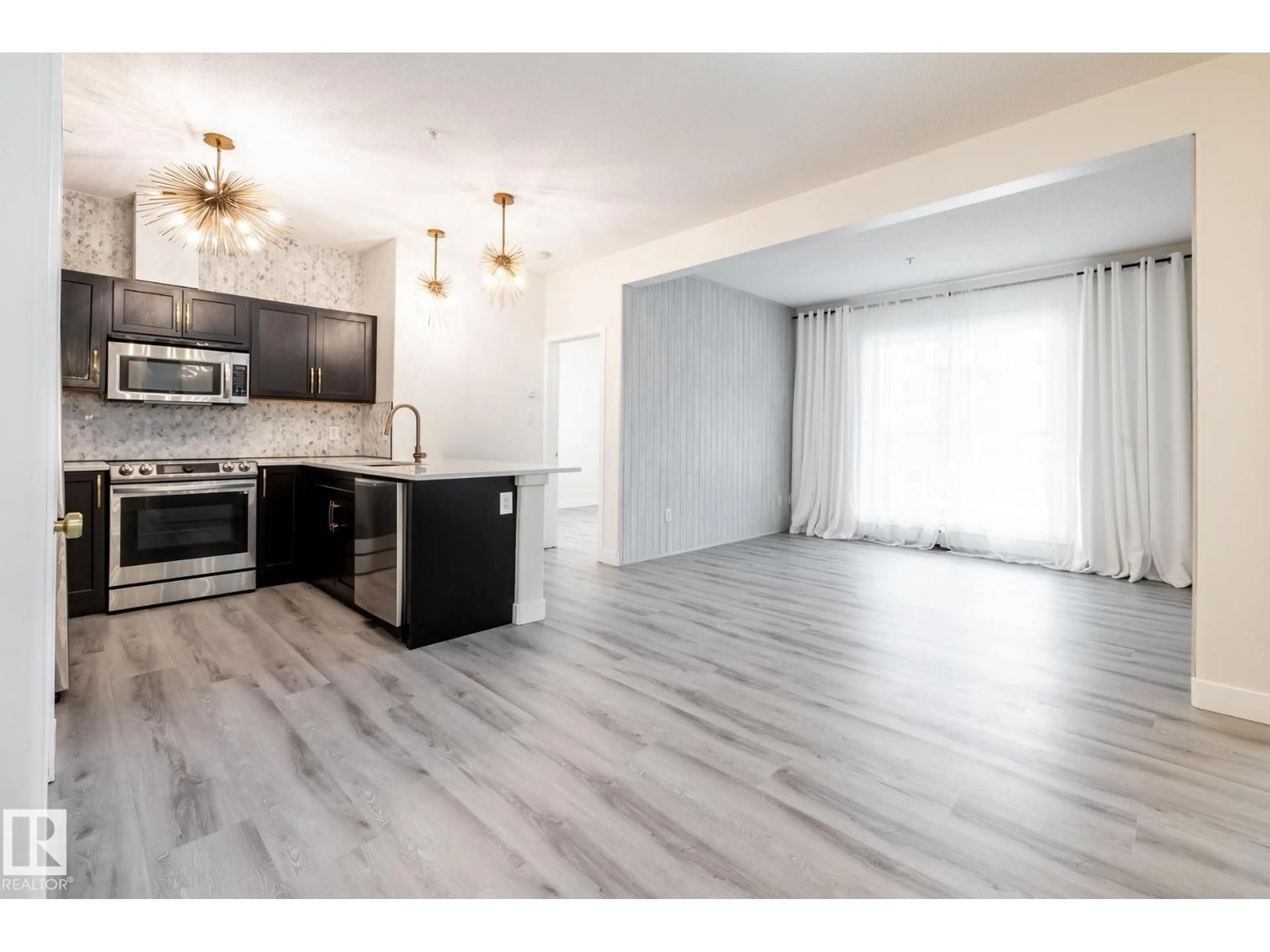 Open concept kitchen, unknown for 304 - 105 AMBLESIDE LINK, Edmonton Alberta T6W0V2