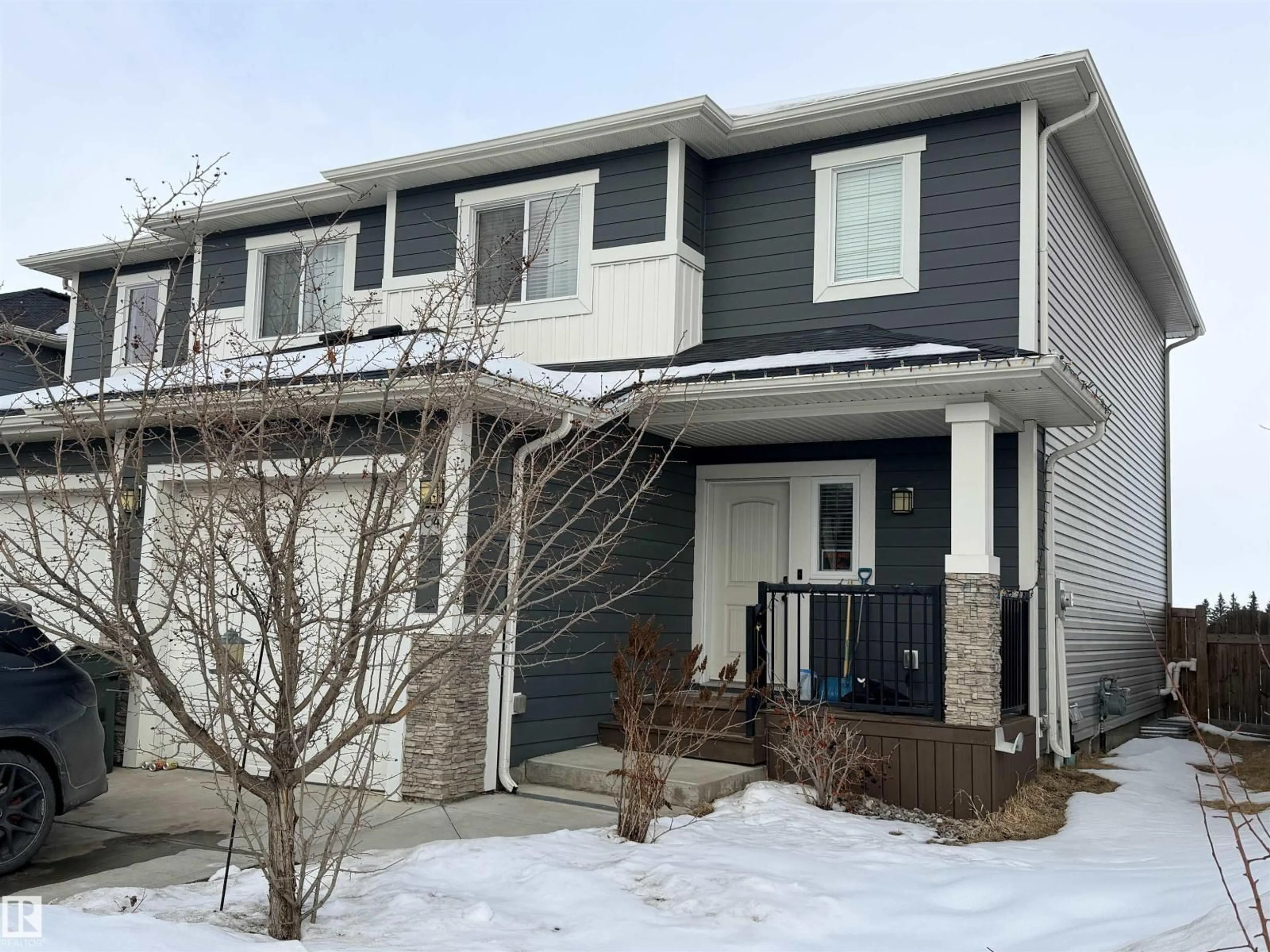 Home with vinyl exterior material, street for 64 HAZELWOOD LN, Spruce Grove Alberta T7X0R7