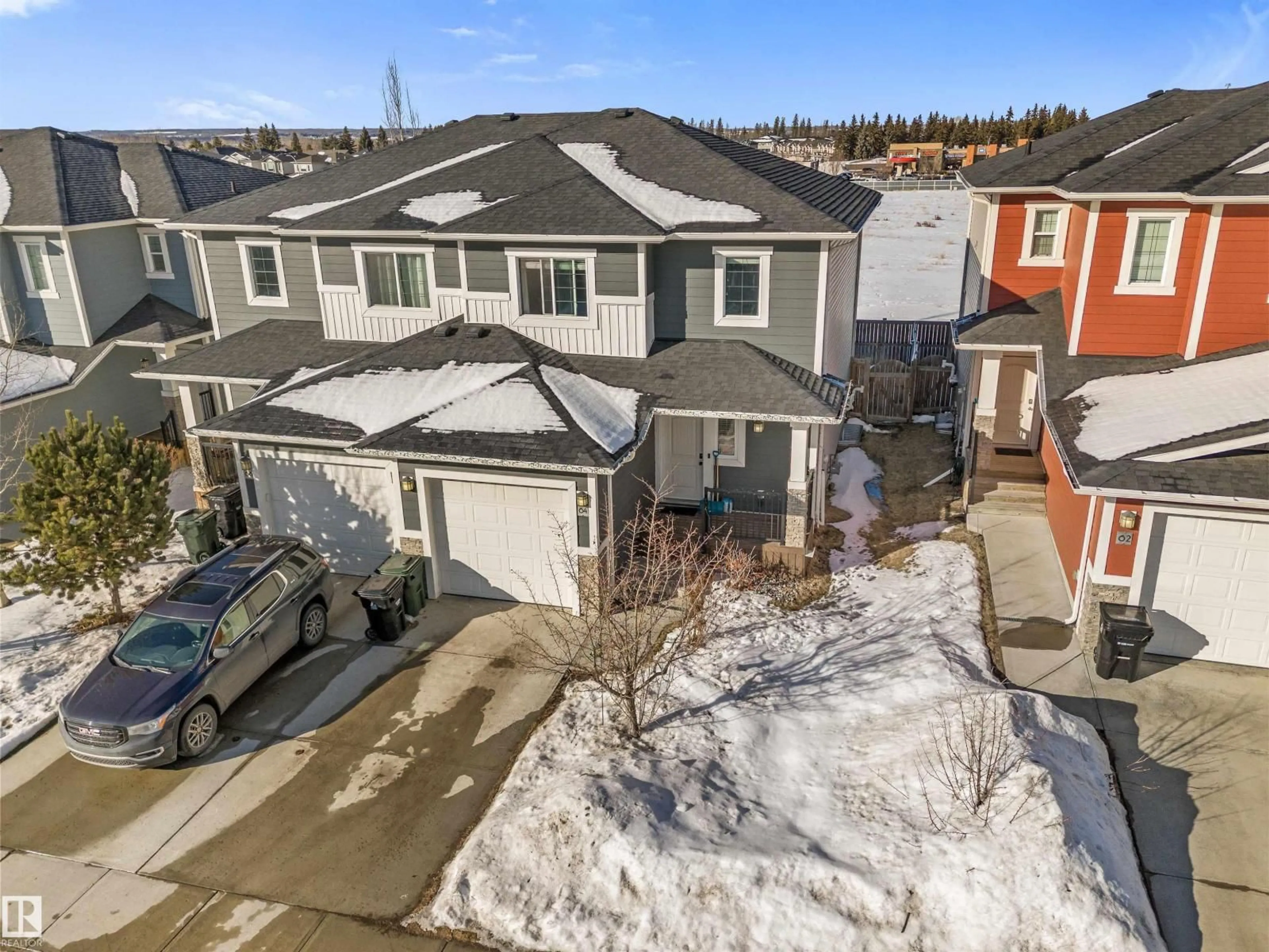A pic from outside/outdoor area/front of a property/back of a property/a pic from drone, mountain view for 64 HAZELWOOD LN, Spruce Grove Alberta T7X0R7