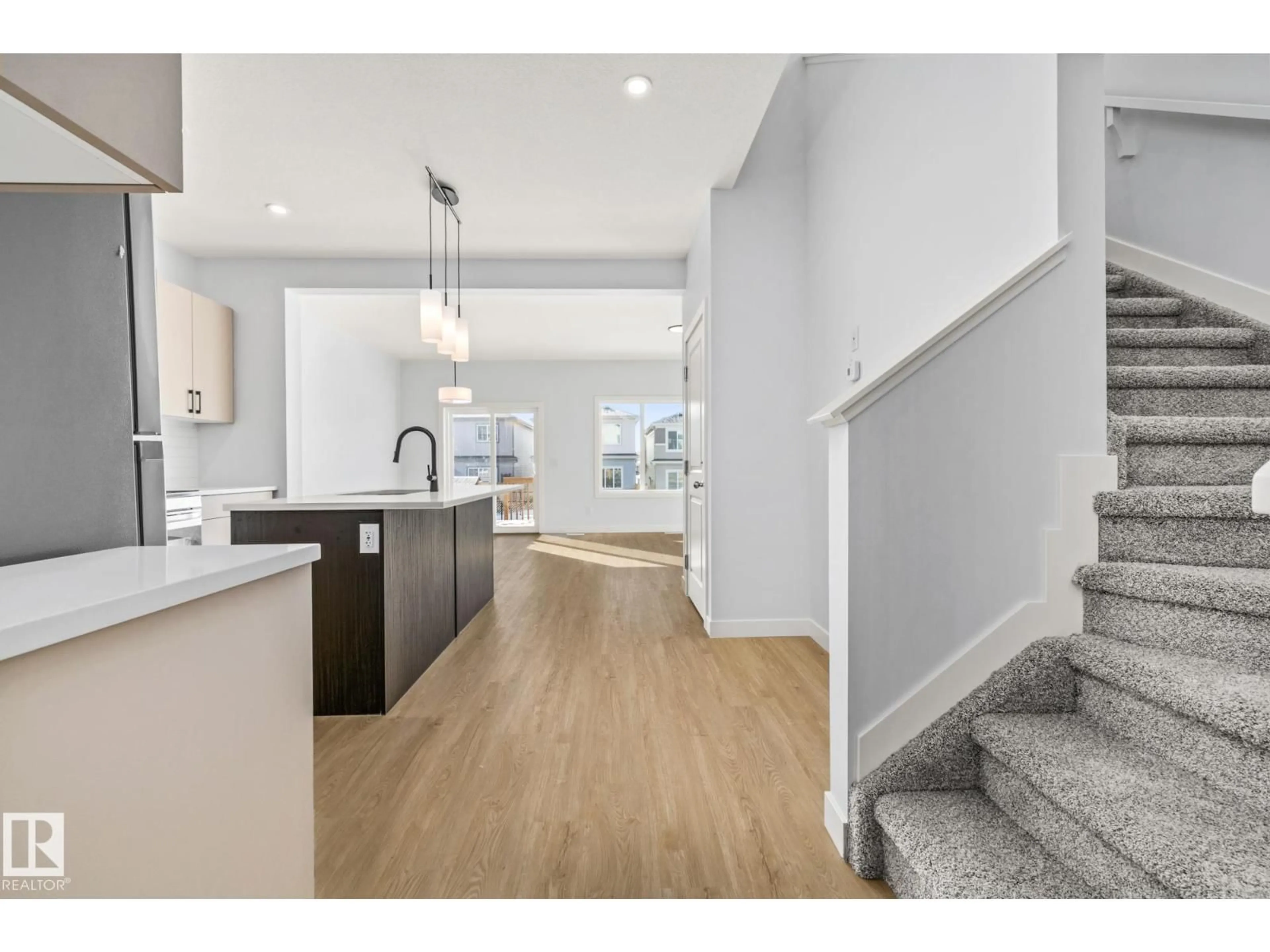 Open concept kitchen, unknown for 110 HONEYSUCKLE GR, Leduc Alberta T9E0K1