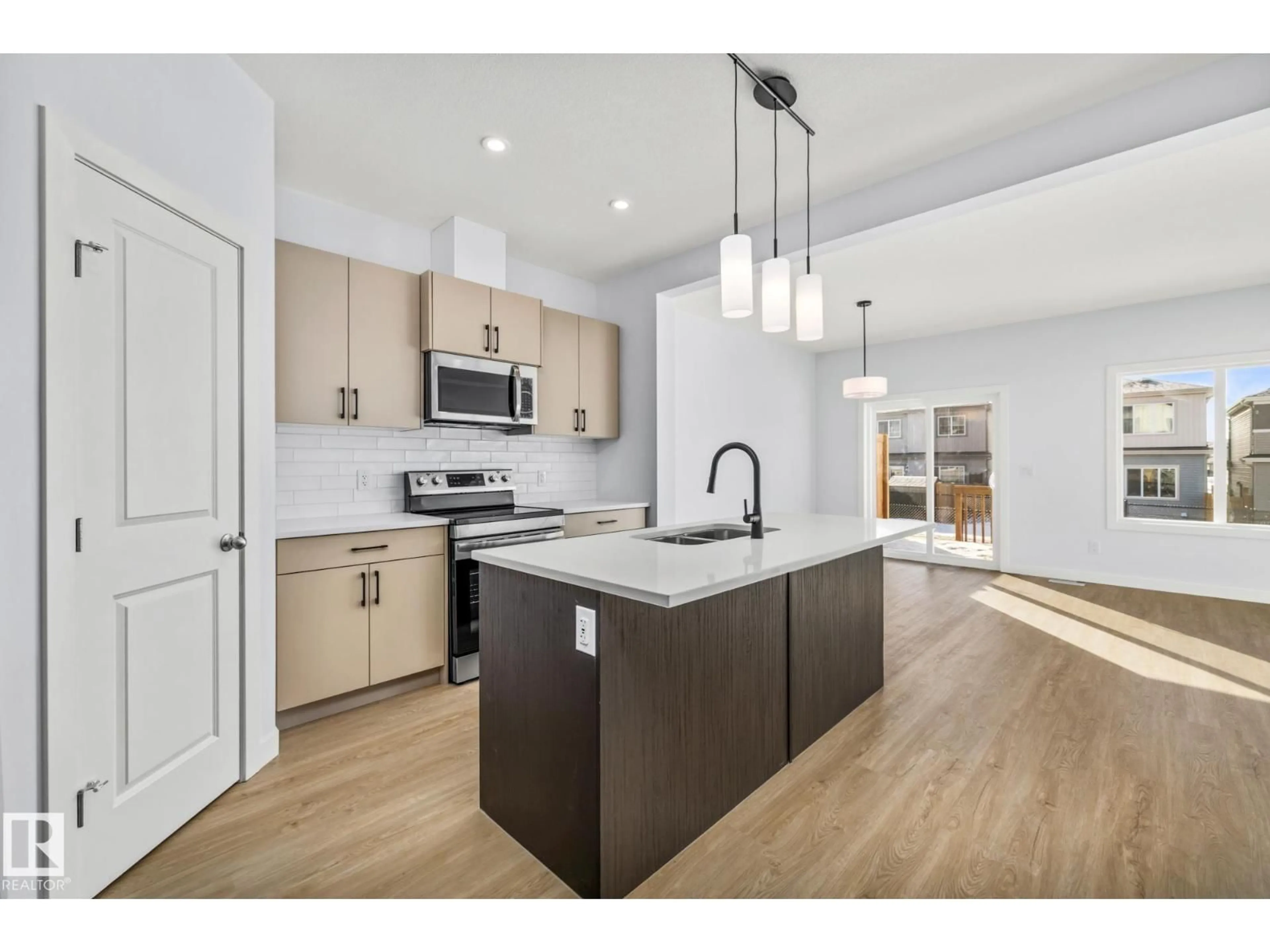 Open concept kitchen, unknown for 110 HONEYSUCKLE GR, Leduc Alberta T9E0K1