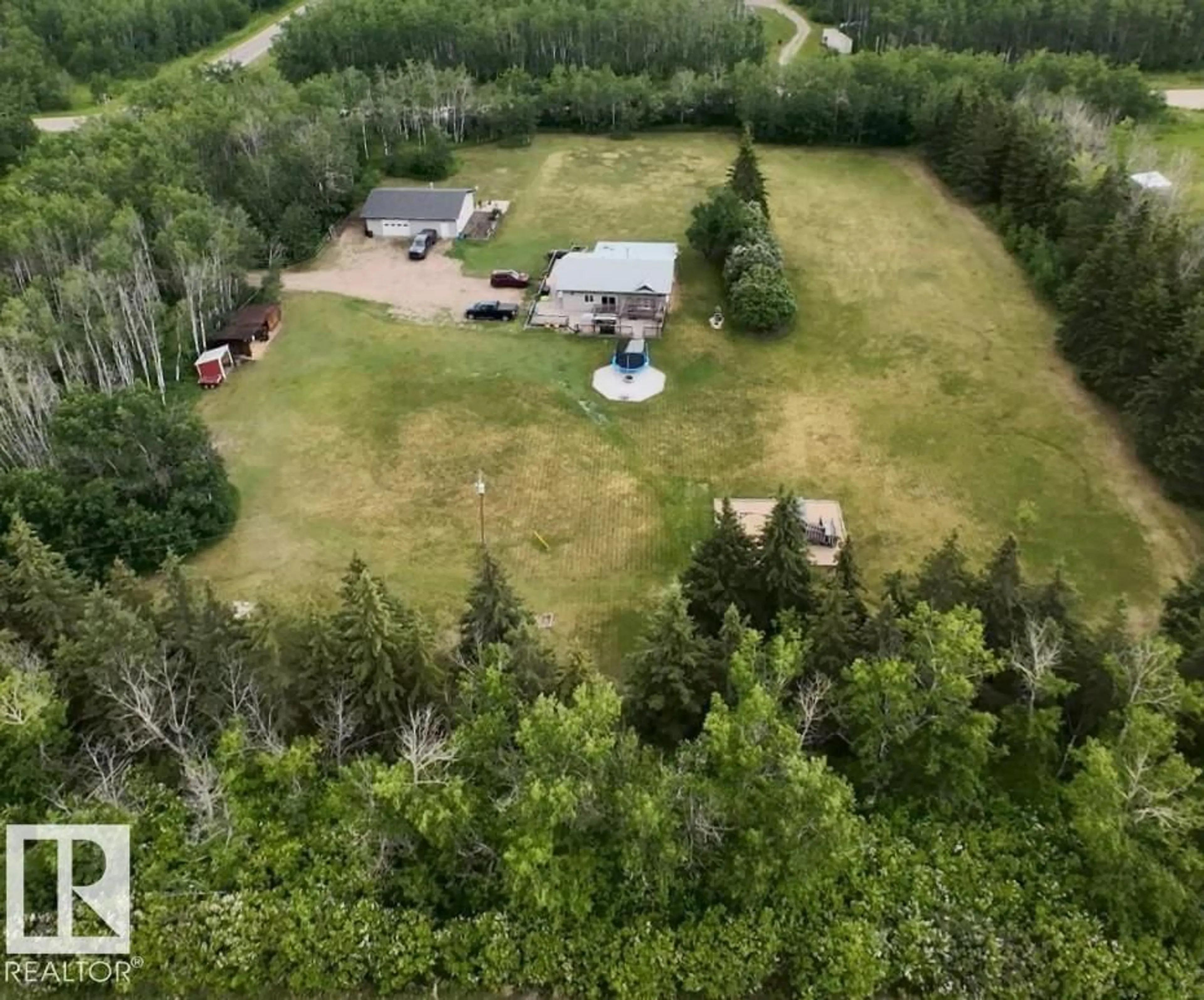 A pic from outside/outdoor area/front of a property/back of a property/a pic from drone, forest/trees view for 44501 TWP RD 604, Rural Bonnyville M.D. Alberta T9N2J6