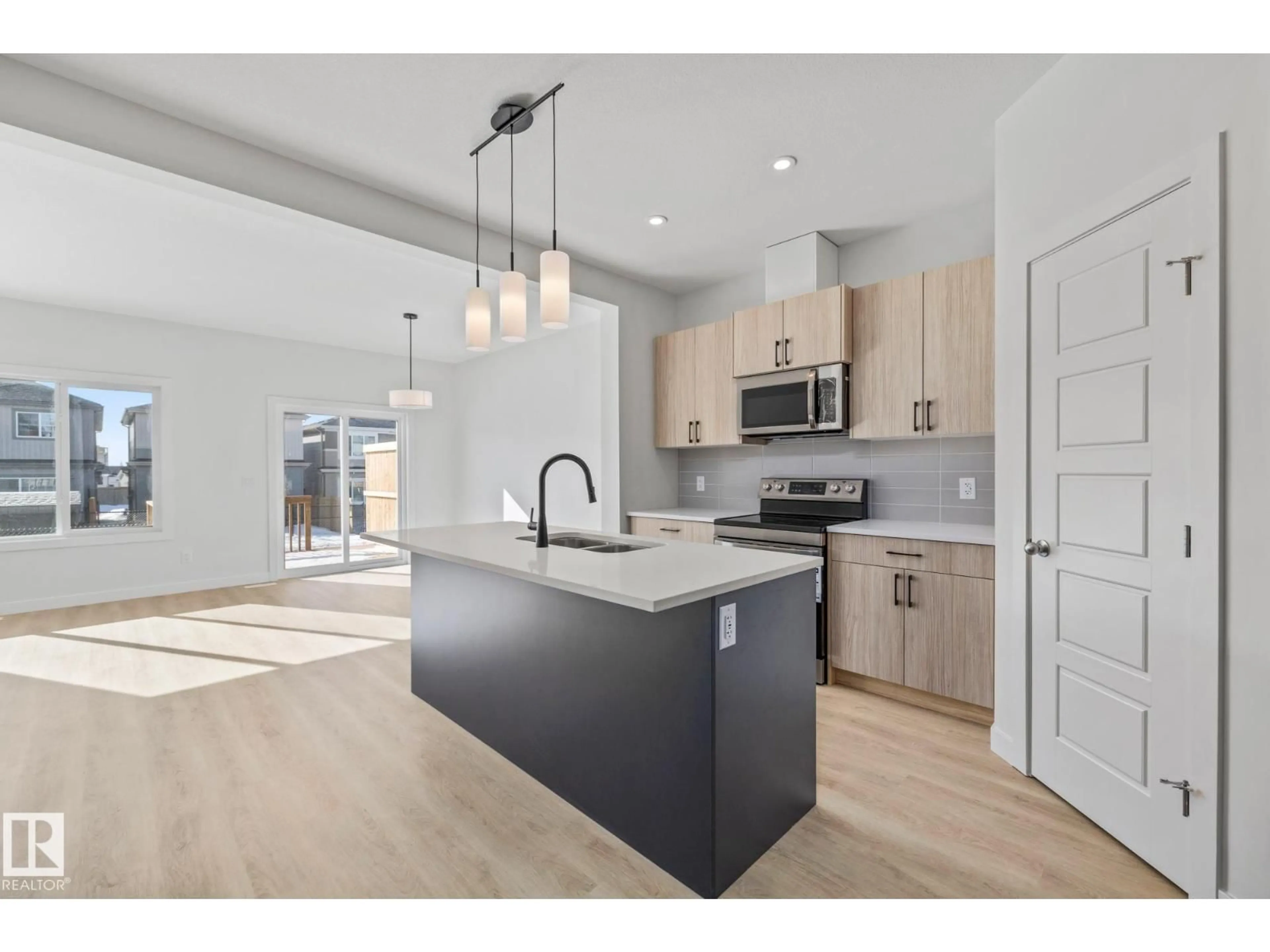 Open concept kitchen, unknown for 112 HONEYSUCKLE GR, Leduc Alberta T9E0V1