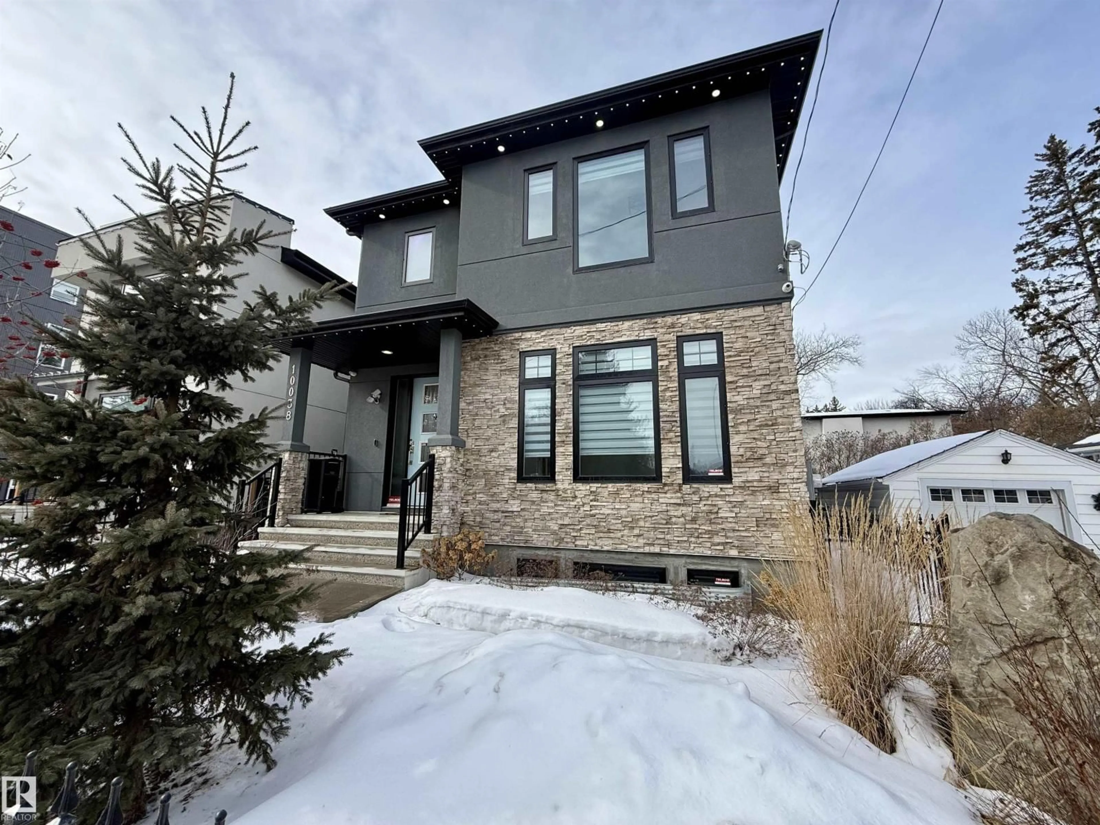 Home with brick exterior material, street for NW - 10038 142 ST, Edmonton Alberta T5N2N5