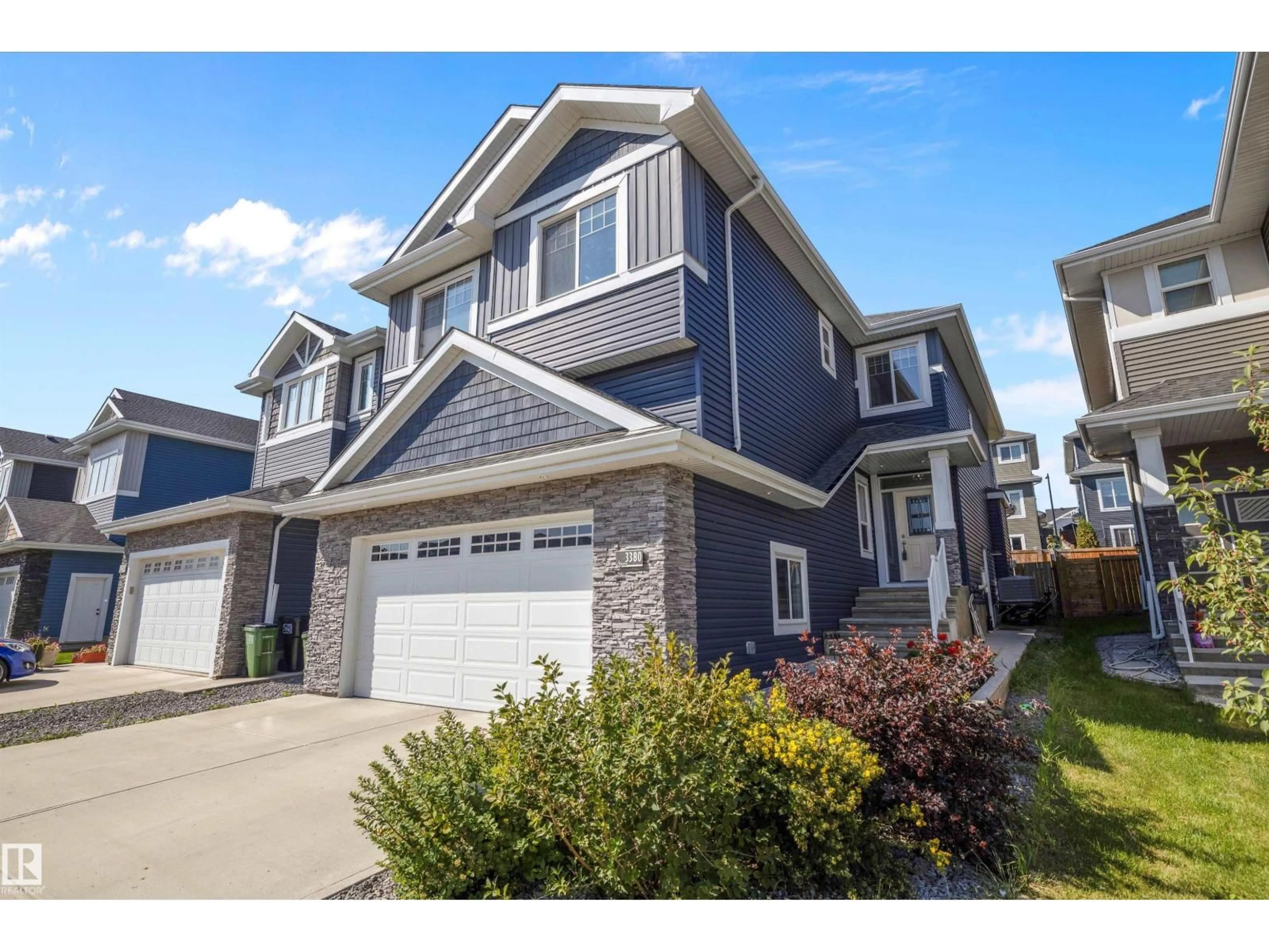 Home with vinyl exterior material, street for 3380 CHICKADEE DR, Edmonton Alberta T5S0K9
