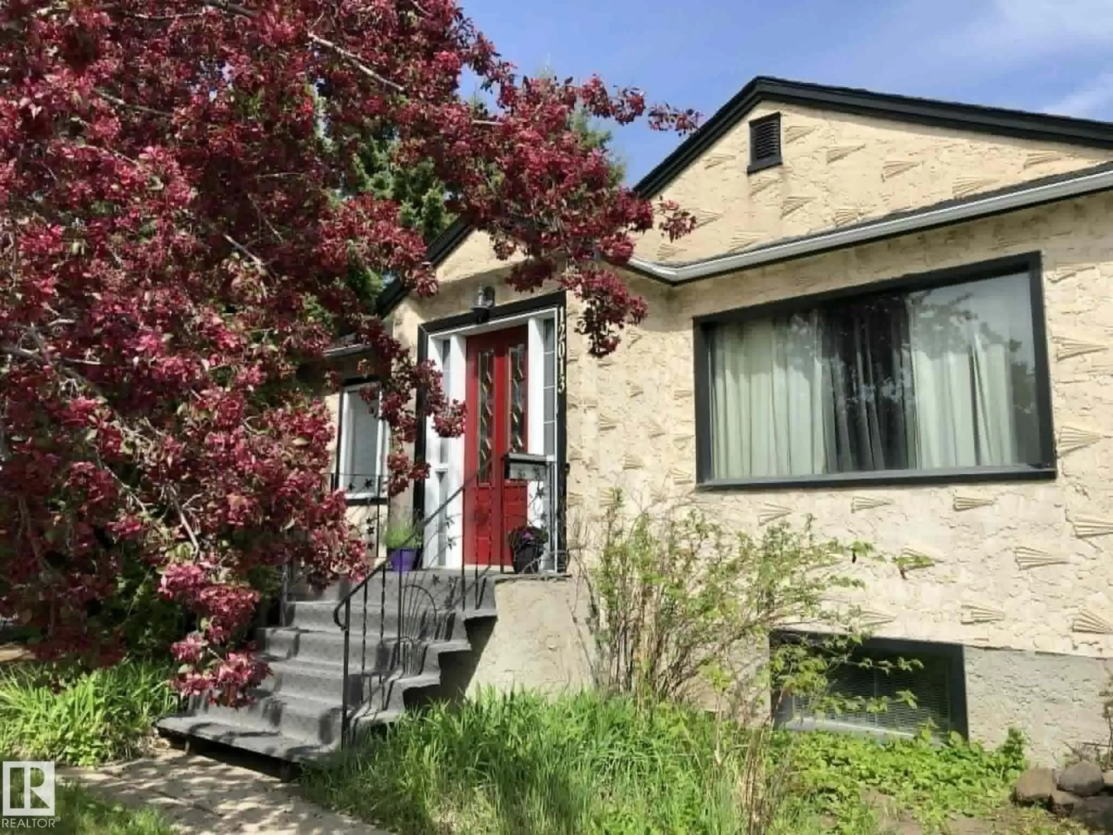 Home with brick exterior material, street for 12013 54 ST, Edmonton Alberta T5W3N2