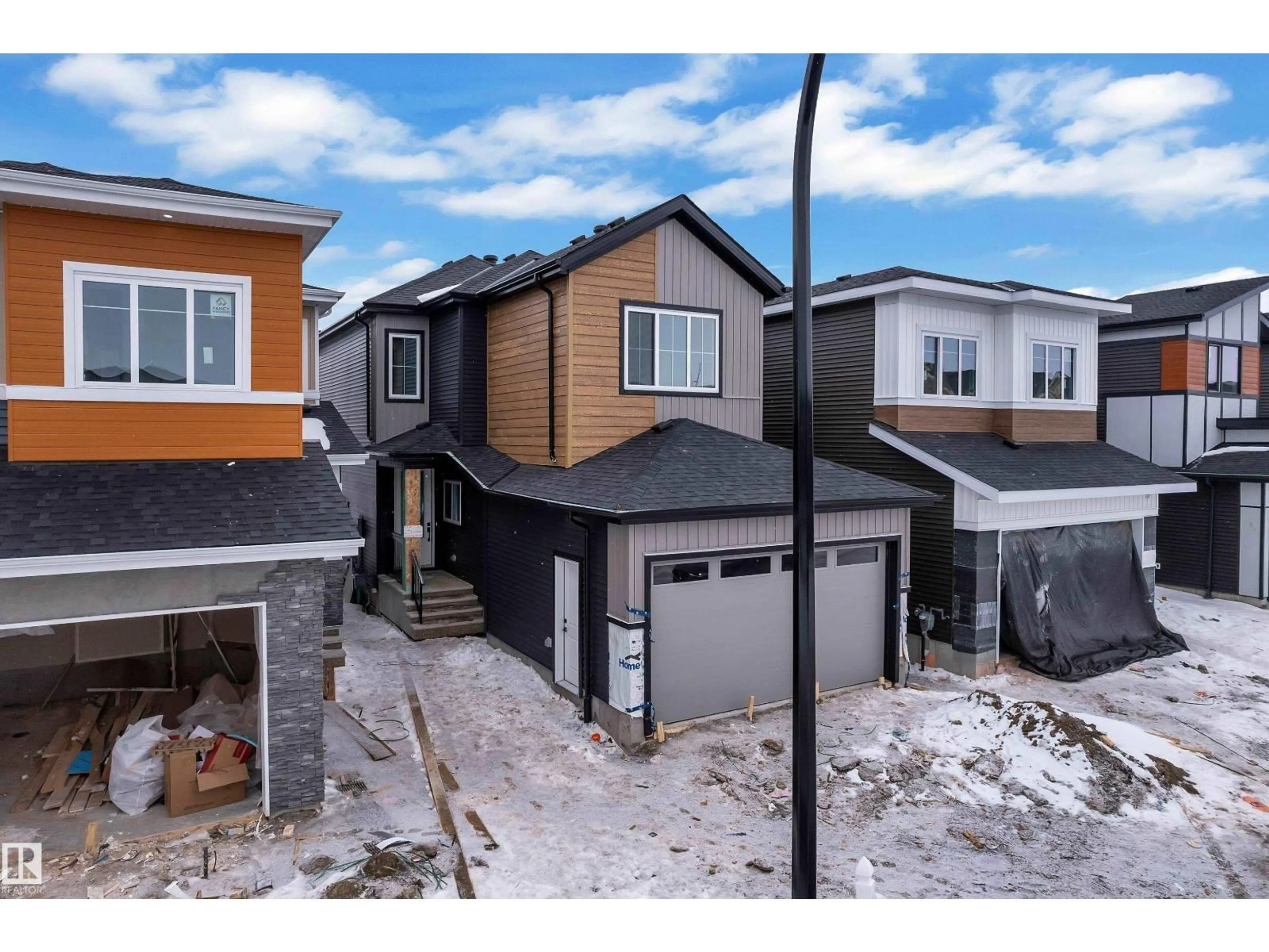 A pic from outside/outdoor area/front of a property/back of a property/a pic from drone, street for SW - 127 24 ST, Edmonton Alberta T6X3K4