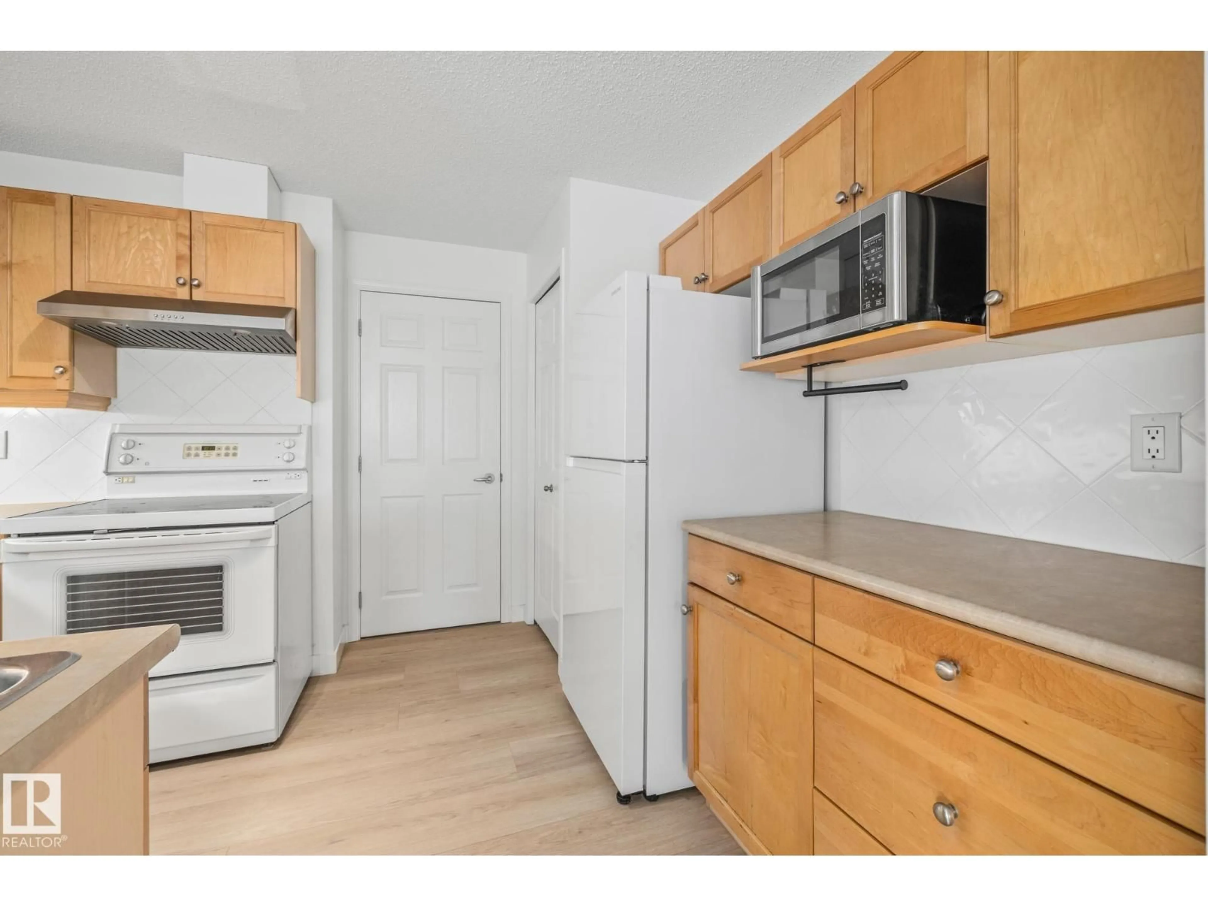 Standard kitchen, unknown for #2 - 1179 SUMMERSIDE DR, Edmonton Alberta T6X1K1