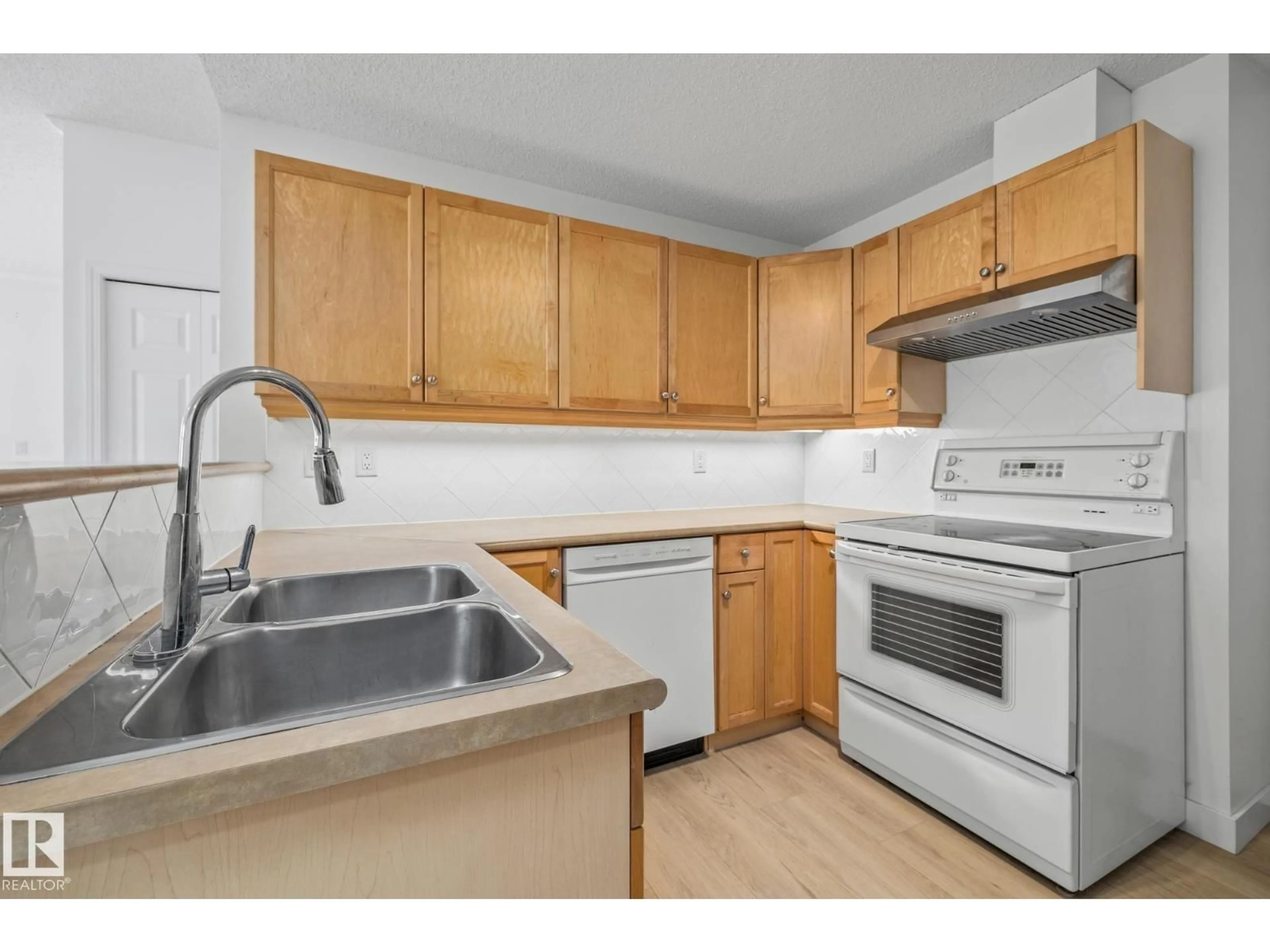 Standard kitchen, unknown for #2 - 1179 SUMMERSIDE DR, Edmonton Alberta T6X1K1