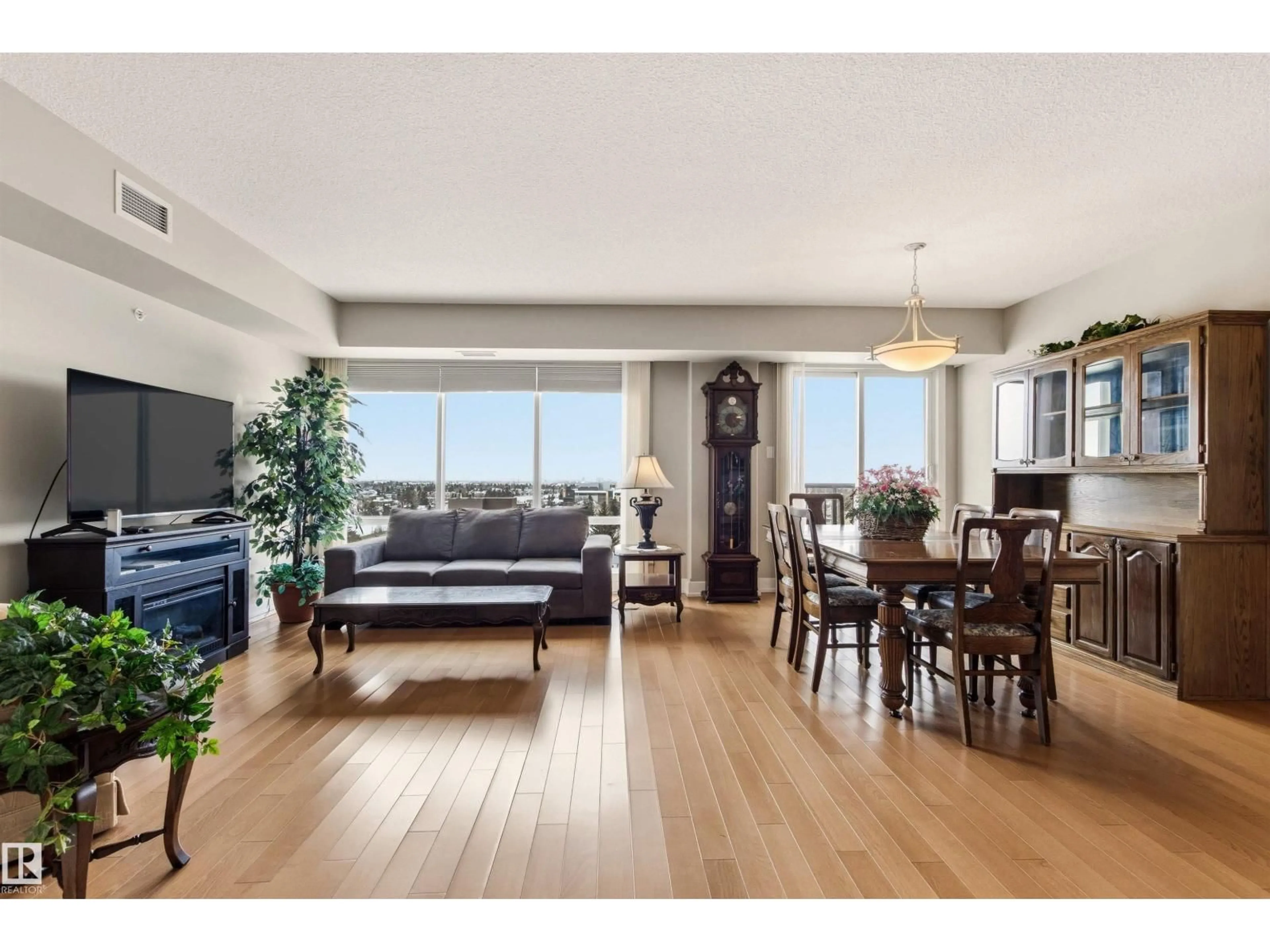 Living room with furniture, wood/laminate floor for 801 - 6608 28 AV, Edmonton Alberta T6L2R1