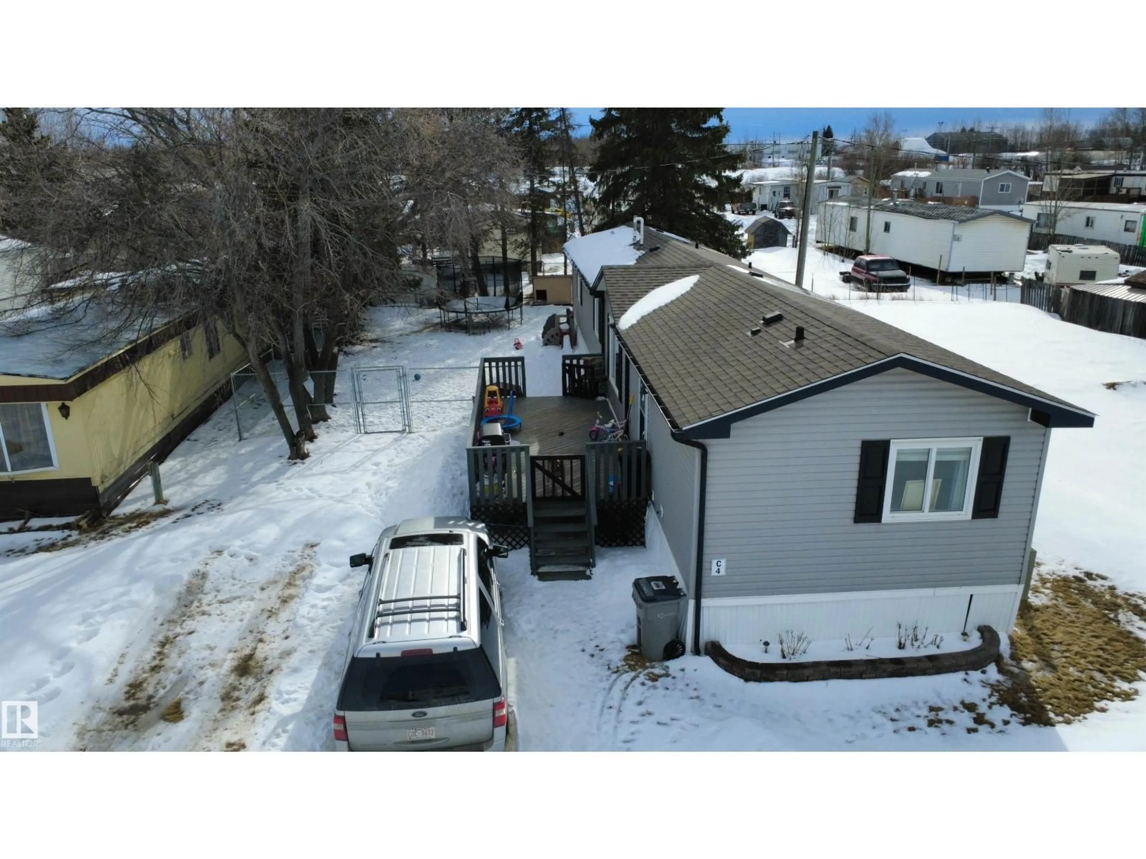 A pic from outside/outdoor area/front of a property/back of a property/a pic from drone, street for C4 - 6402 52 AVENUE, Drayton Valley Alberta T7A1N3