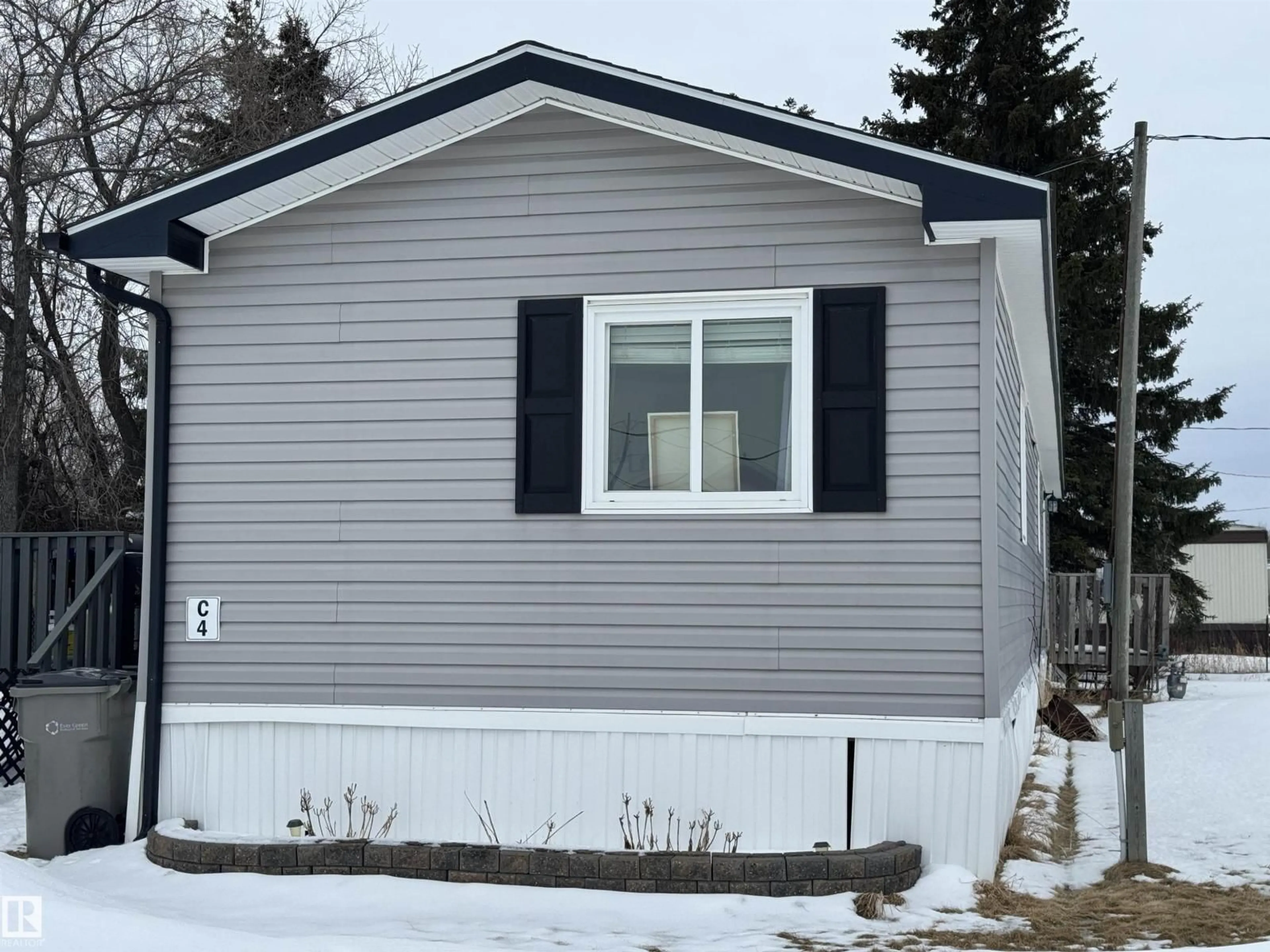 Home with vinyl exterior material, street for C4 - 6402 52 AVENUE, Drayton Valley Alberta T7A1N3