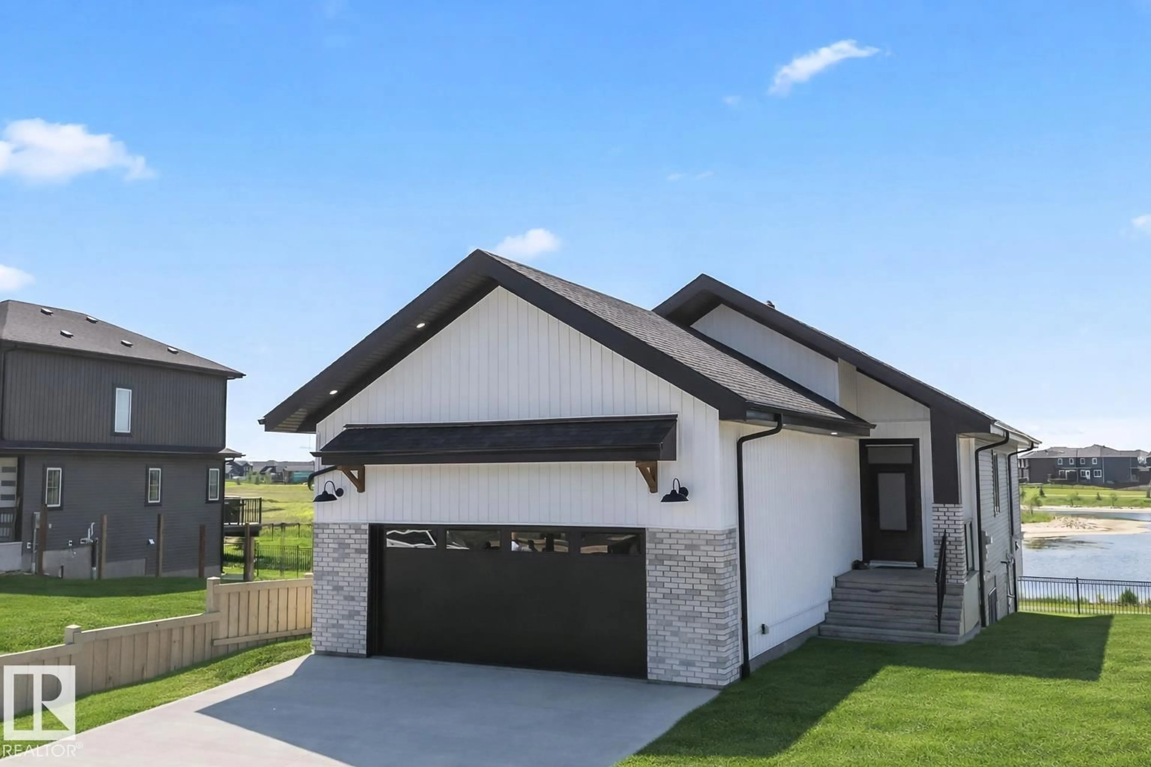 Home with brick exterior material, street for 1411 REDPOLL COURT, Edmonton Alberta T5S0V4