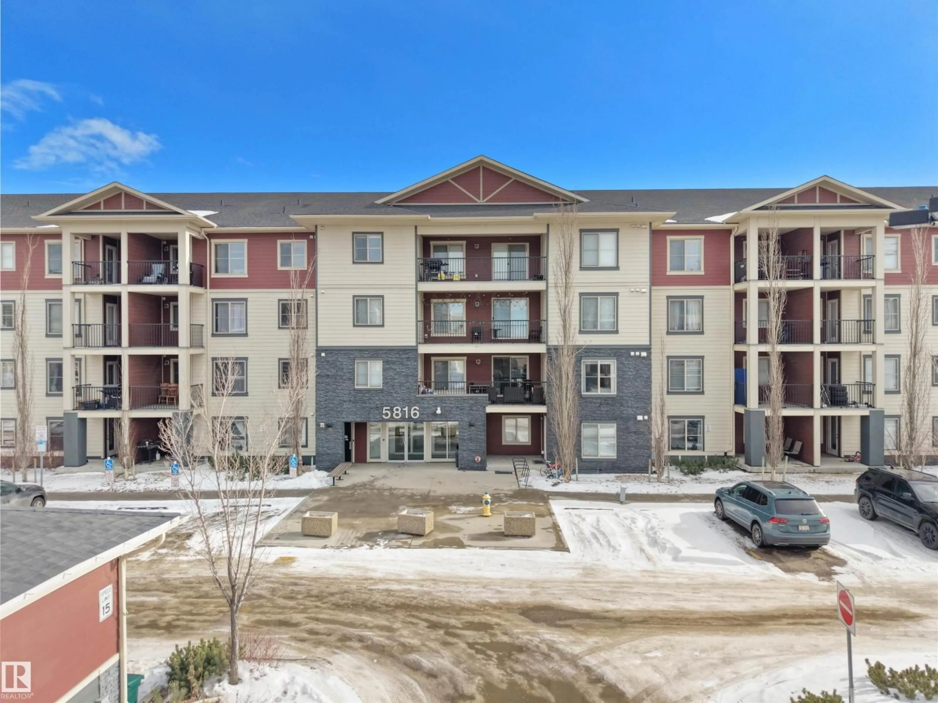 A pic from outside/outdoor area/front of a property/back of a property/a pic from drone, unknown for #422 - 5816 MULLEN PL, Edmonton Alberta T6R0W3