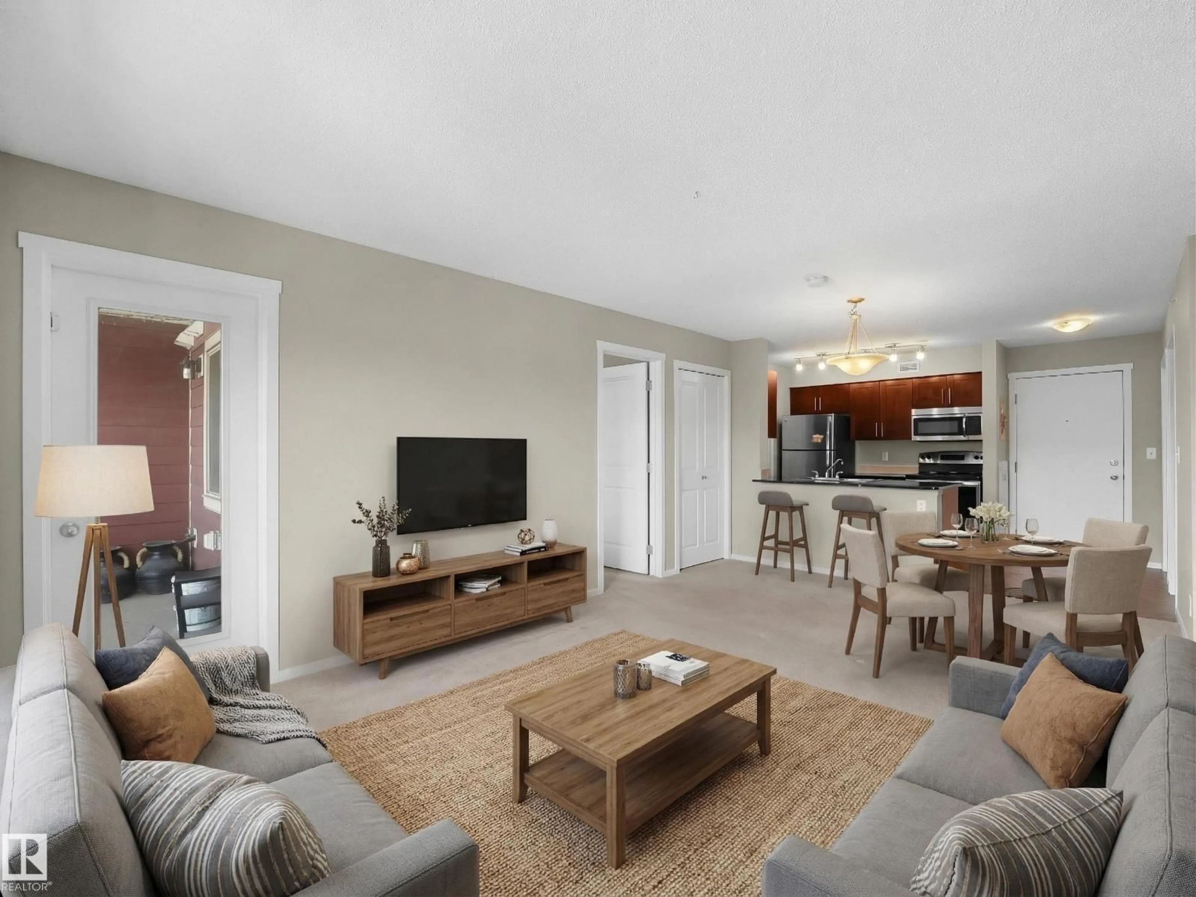 Living room with furniture, unknown for #422 - 5816 MULLEN PL, Edmonton Alberta T6R0W3