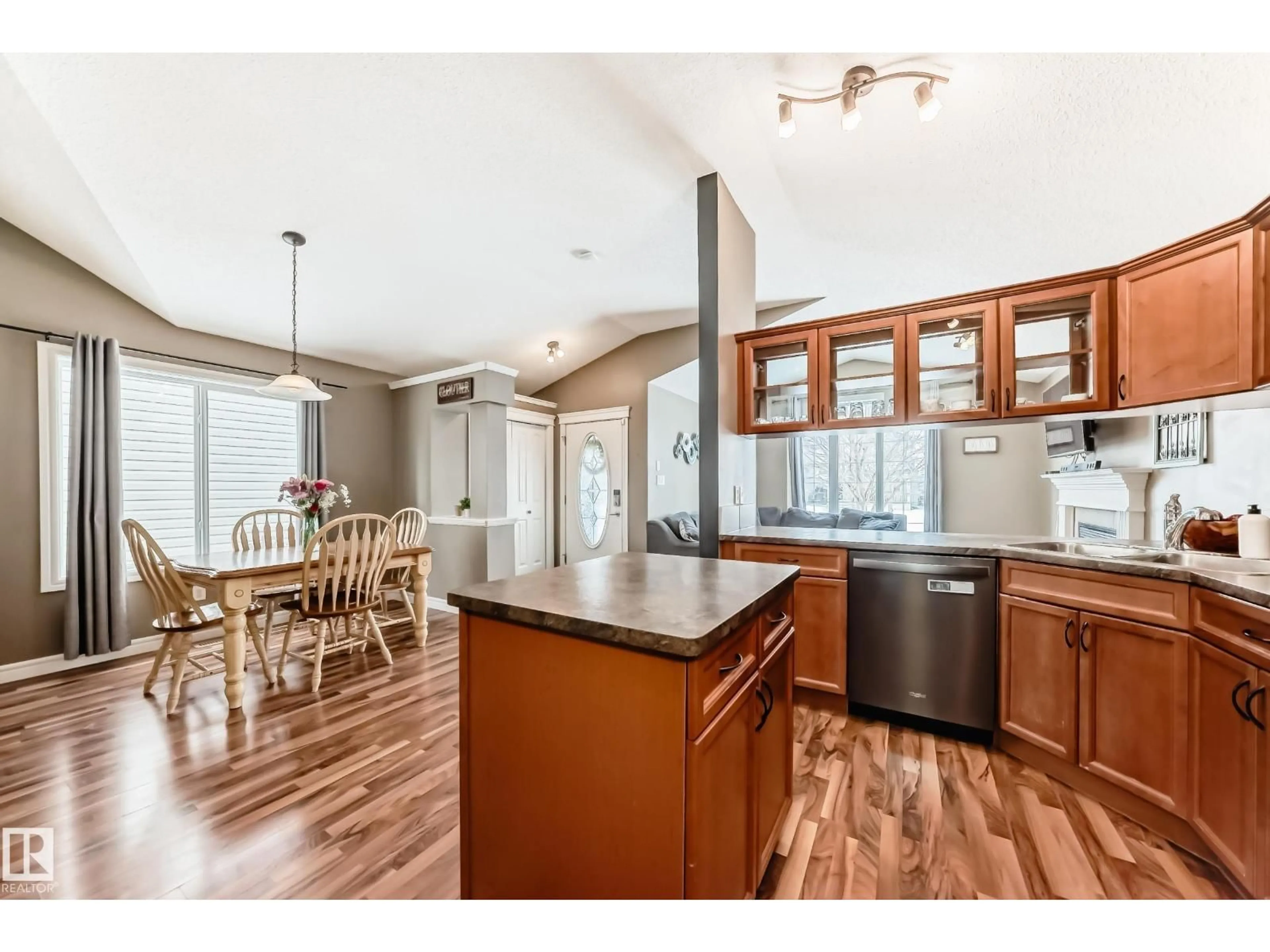 Open concept kitchen, wood/laminate floor for 87 SUMMERWOOD DR, Sherwood Park Alberta T8H0B3