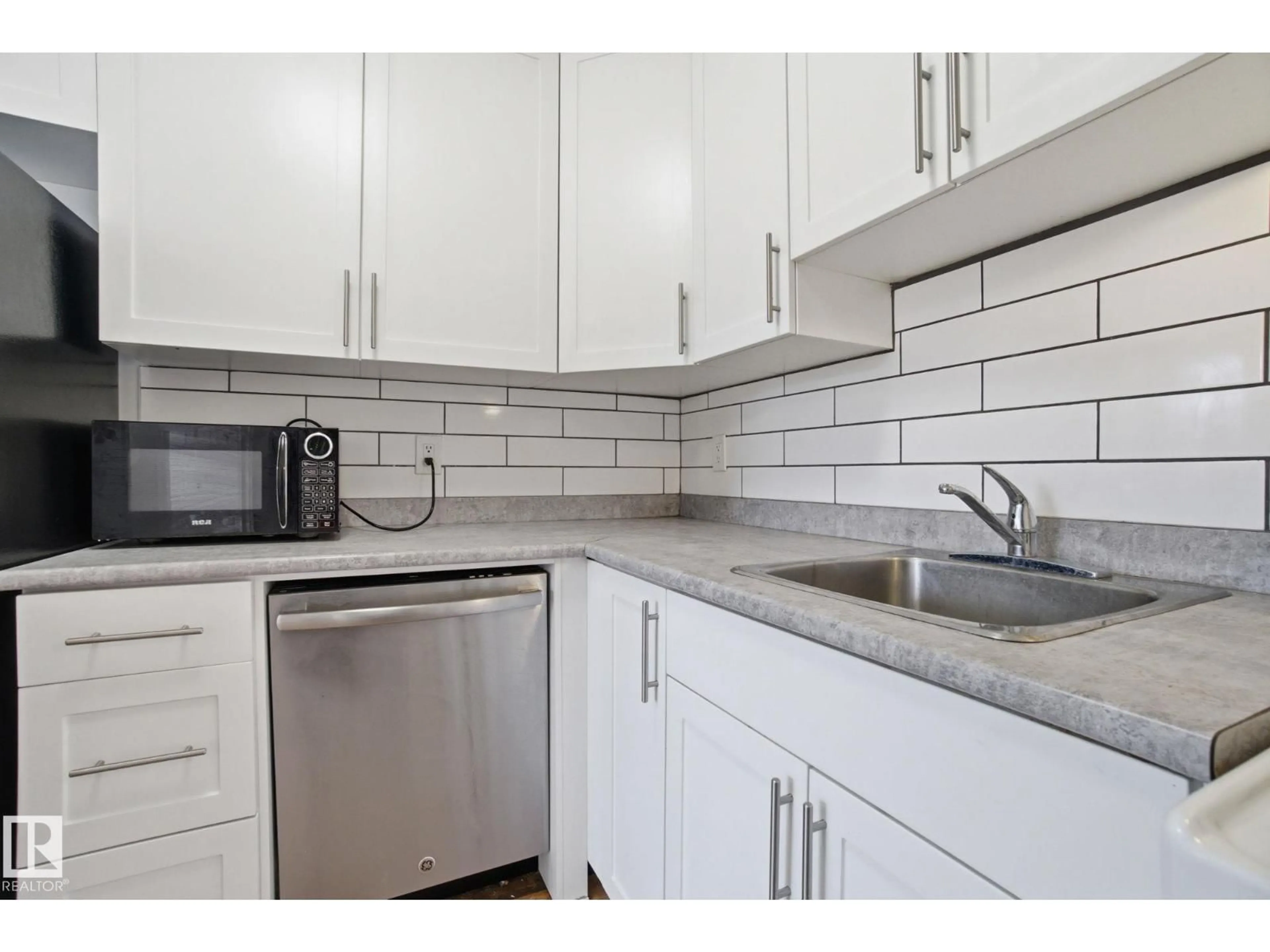 Standard kitchen, ceramic/tile floor for 3321 107 AV, Edmonton Alberta T5W0C6