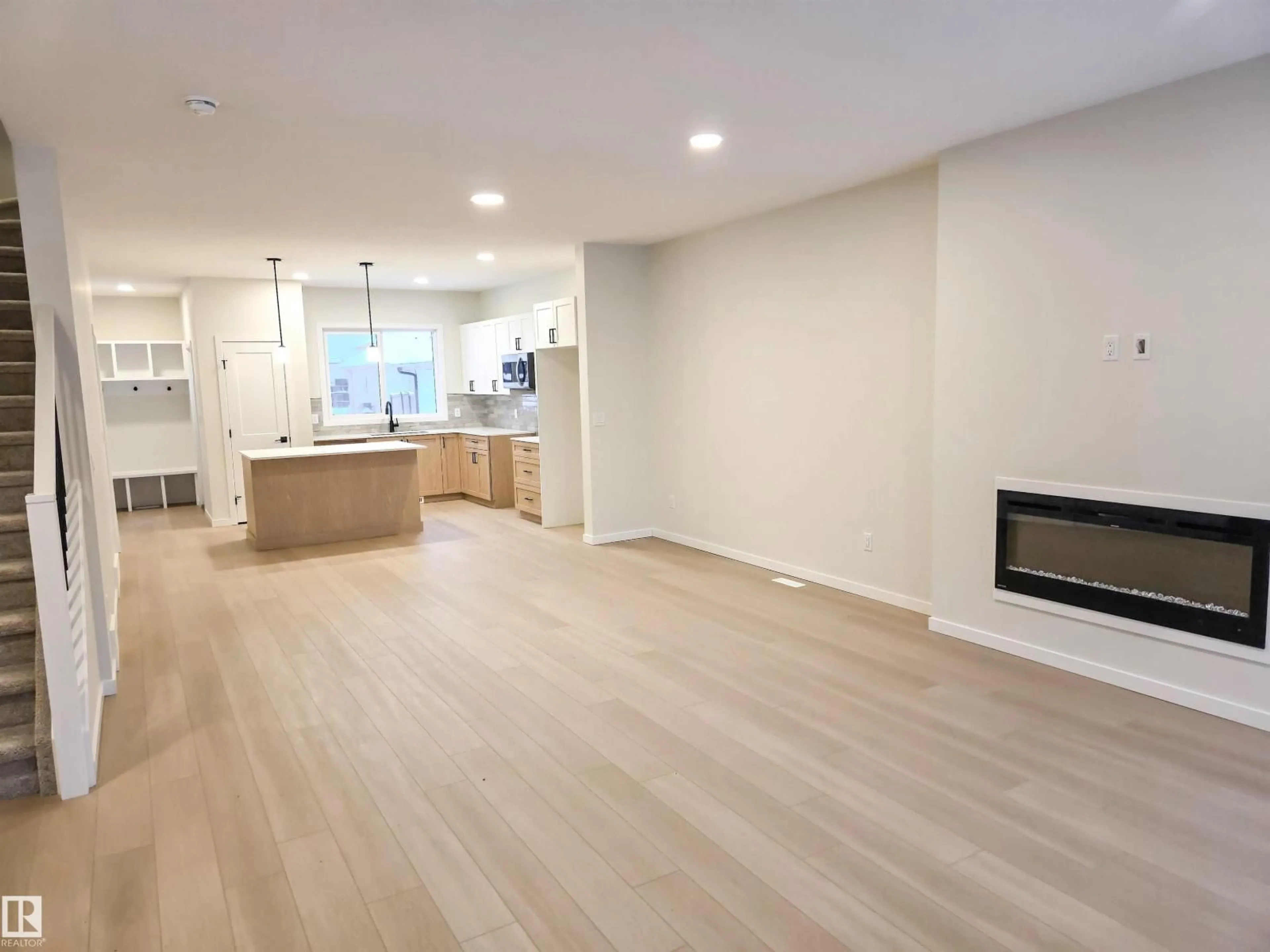 Open concept kitchen, wood/laminate floor for 10 HUNTER PL, Spruce Grove Alberta T7X3W3