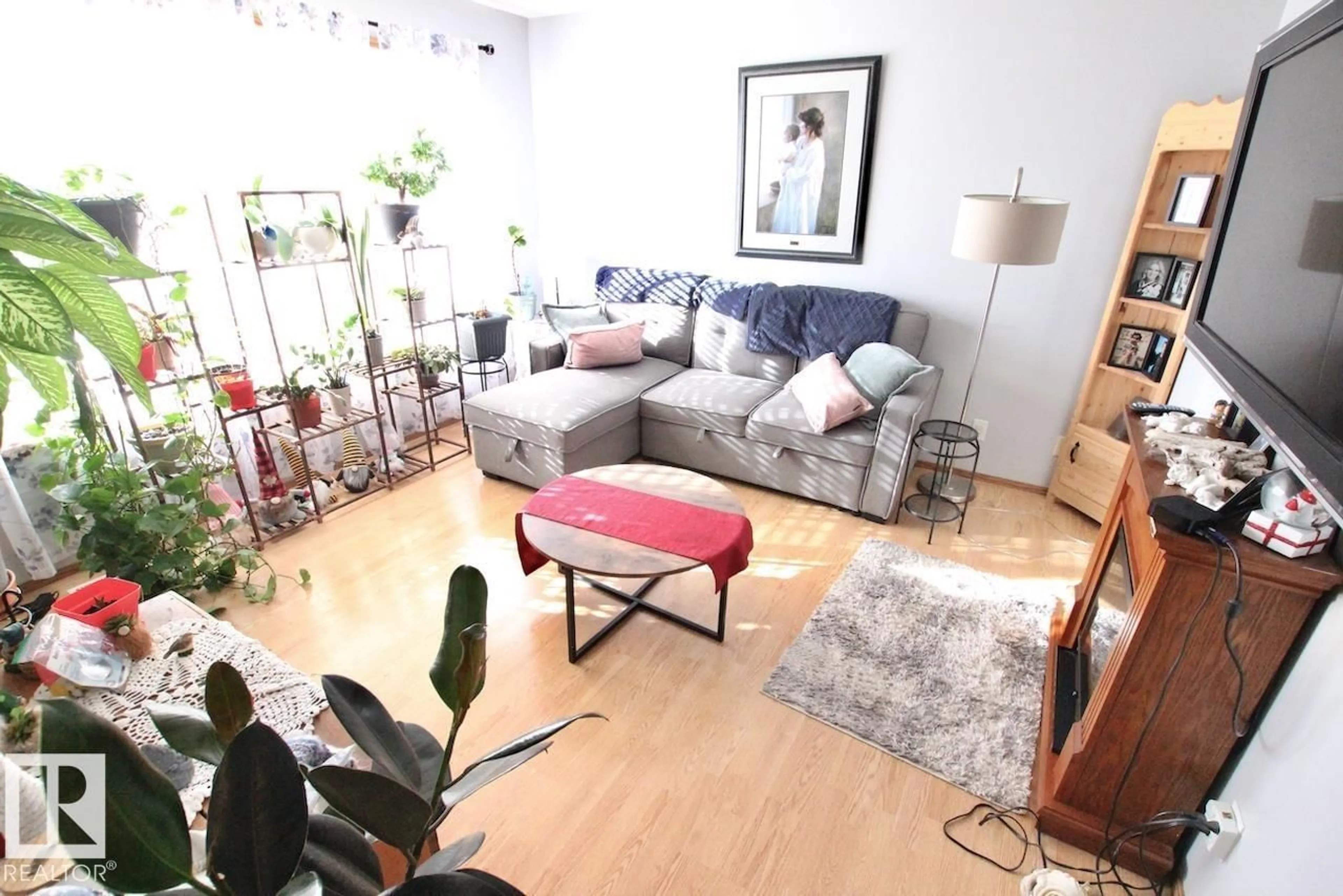 Living room with furniture, unknown for 5110 - 5112 48 AV, St. Paul Town Alberta T0A3A0