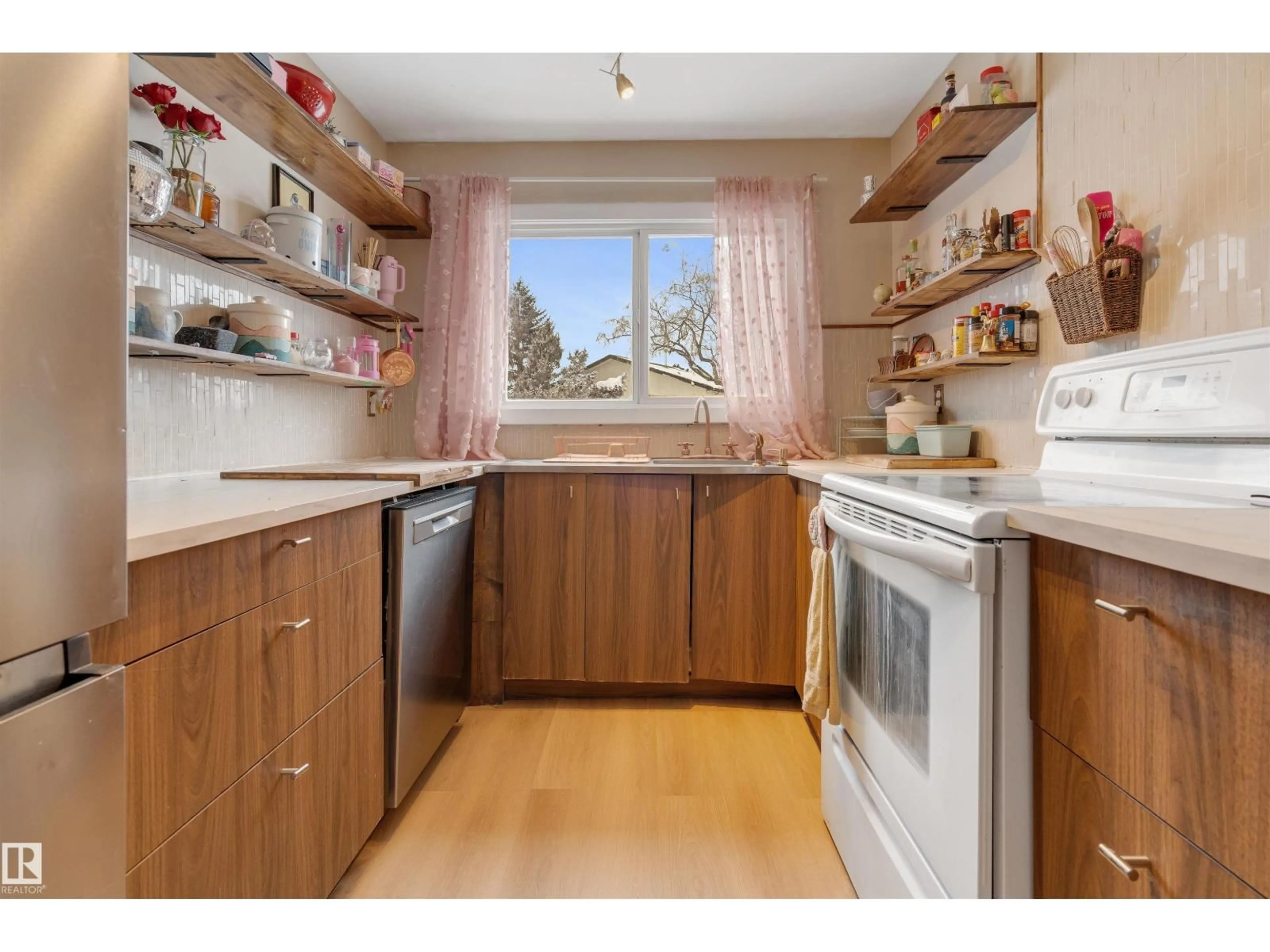 Standard kitchen, wood/laminate floor for #101 - 16725 106 ST, Edmonton Alberta T5X5G5