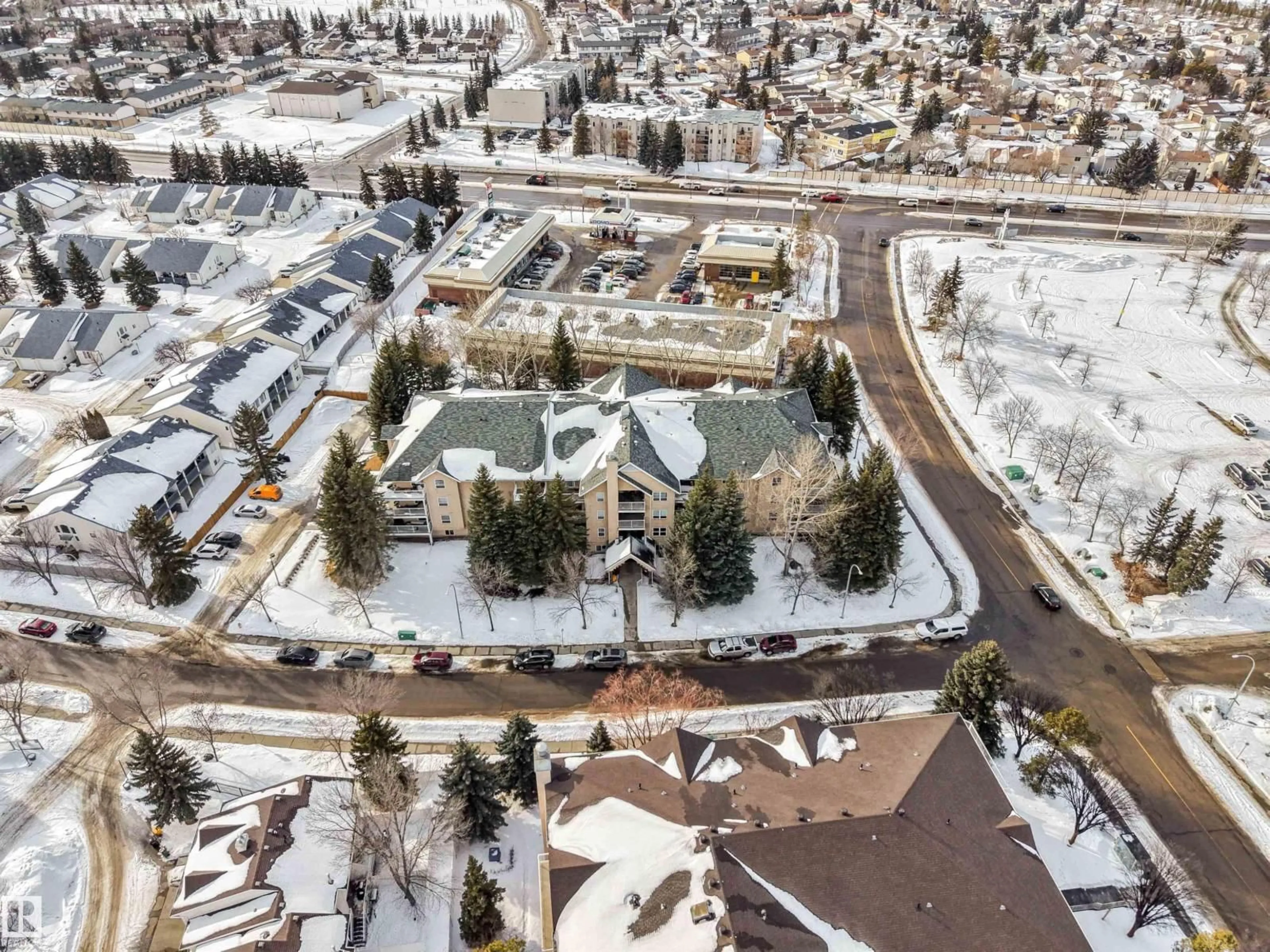 A pic from outside/outdoor area/front of a property/back of a property/a pic from drone, street for #107 - 9760 176 ST, Edmonton Alberta T5T5Z5